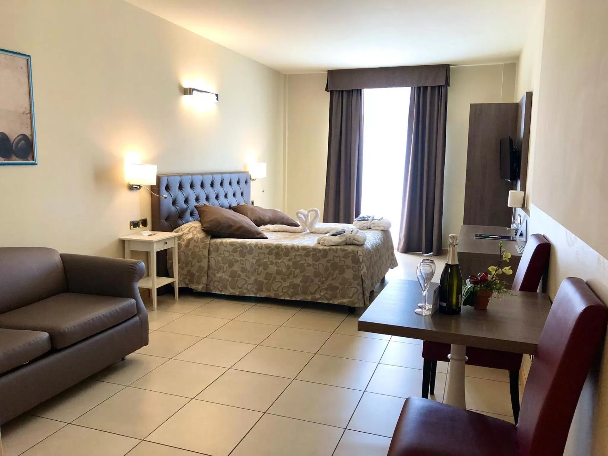 Bed in Hotel Lovere Resort & Spa