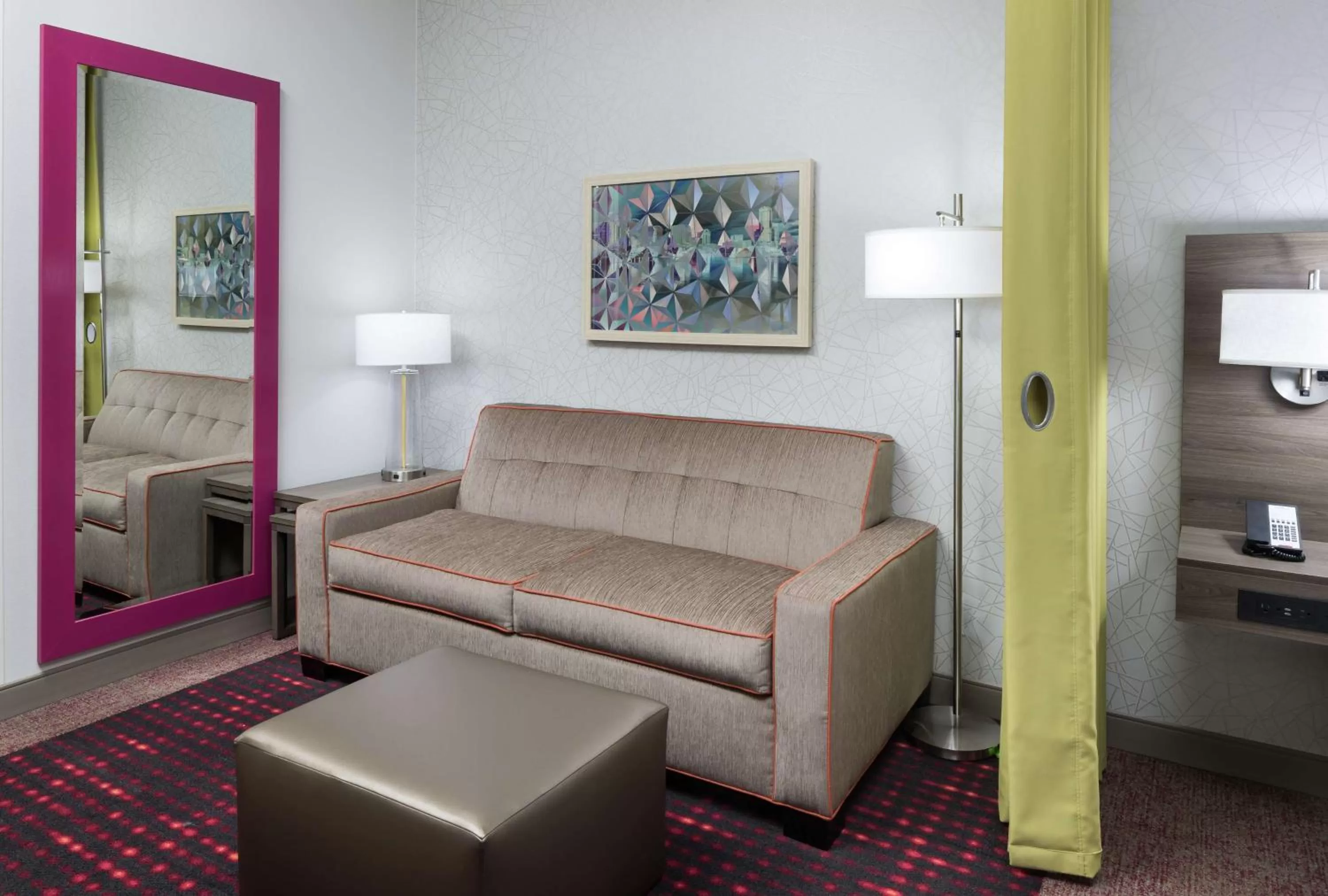 Living room in Home2 Suites By Hilton Orlando Airport