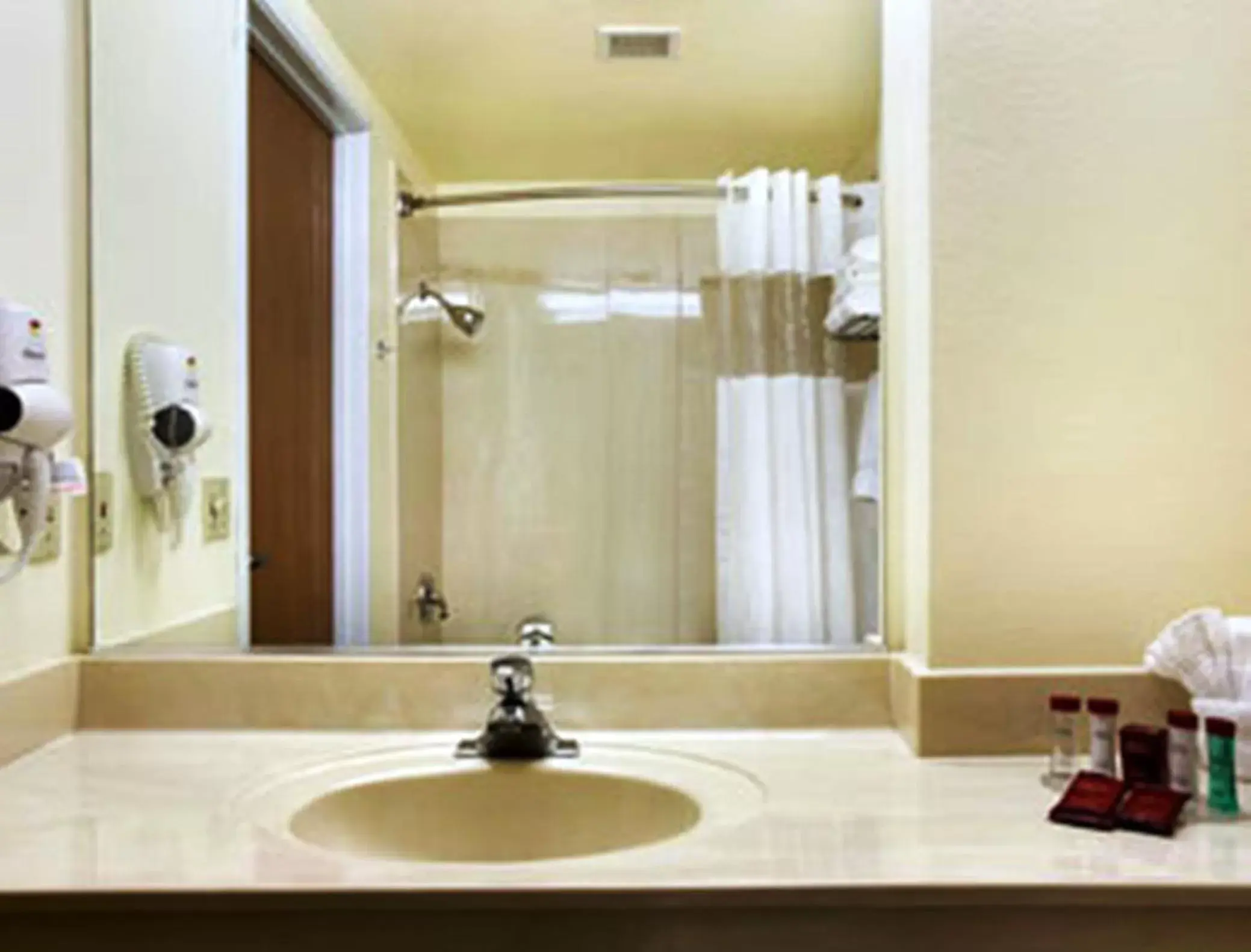 Bathroom in Ramada by Wyndham Williams