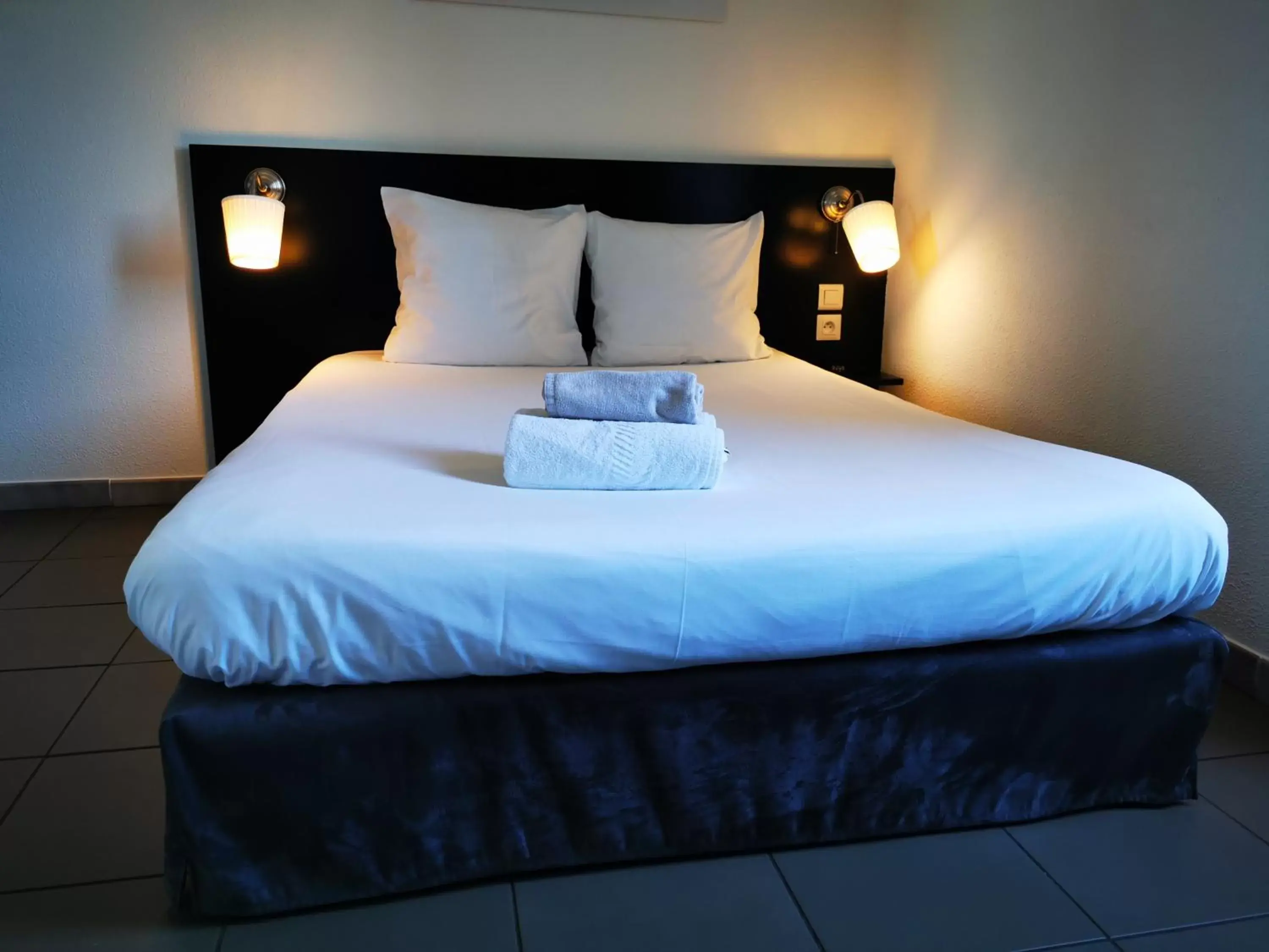 Bed in Hôtel Ponson