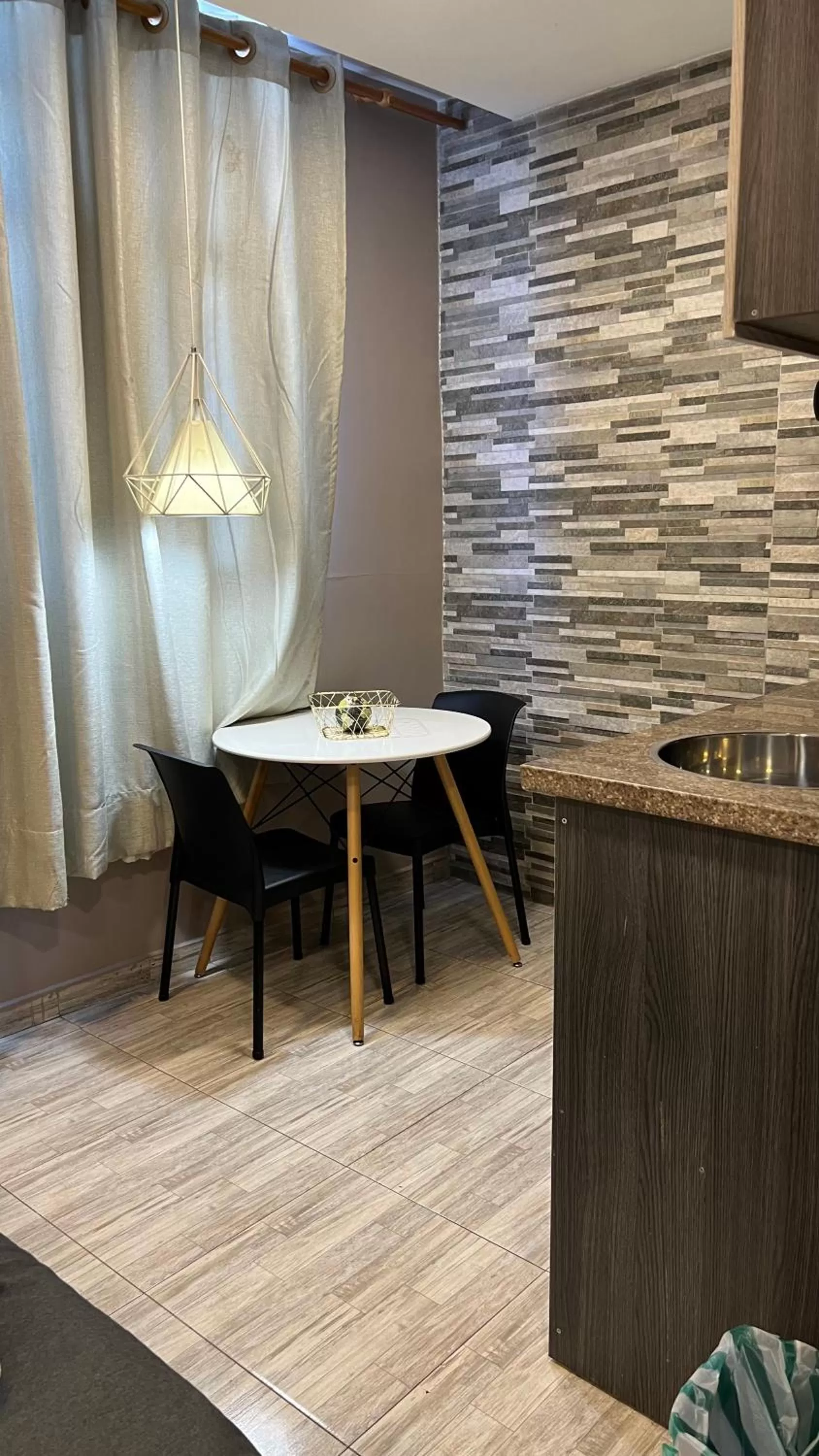 Kitchen or kitchenette in Bahia 79 Apartasuites Cerca al Centro