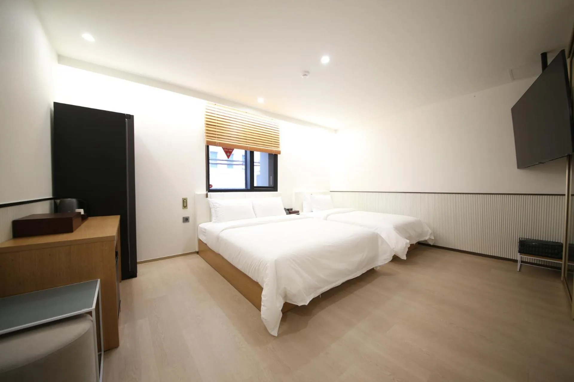 Bed in Jjak Boutique Hotel