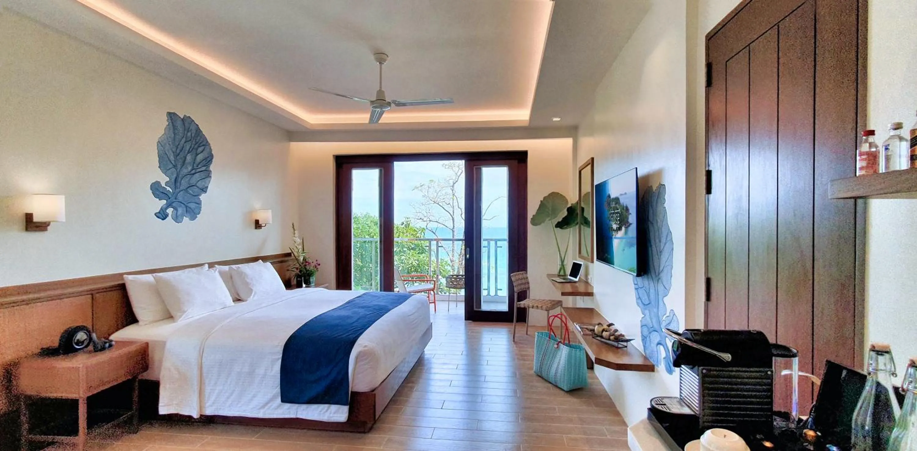 Photo of the whole room, Bed in Discovery Coron formerly Club Paradise Palawan