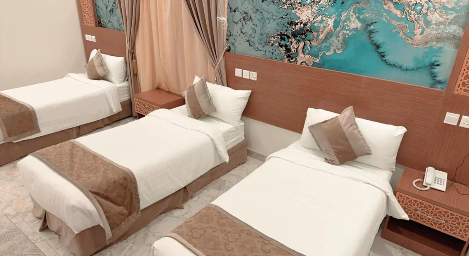 Bed in Taj Aleiman Hotel 