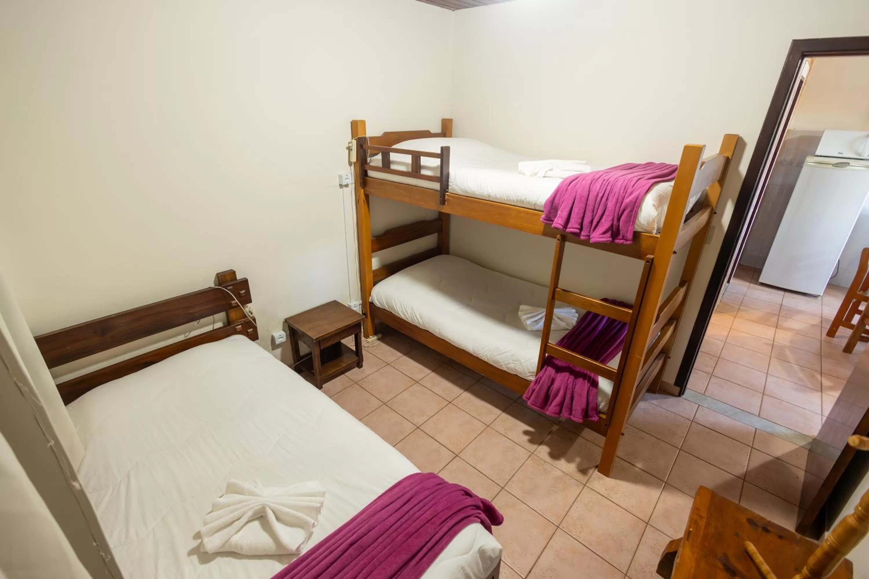 Bed in Pousada 3 Pinheiros