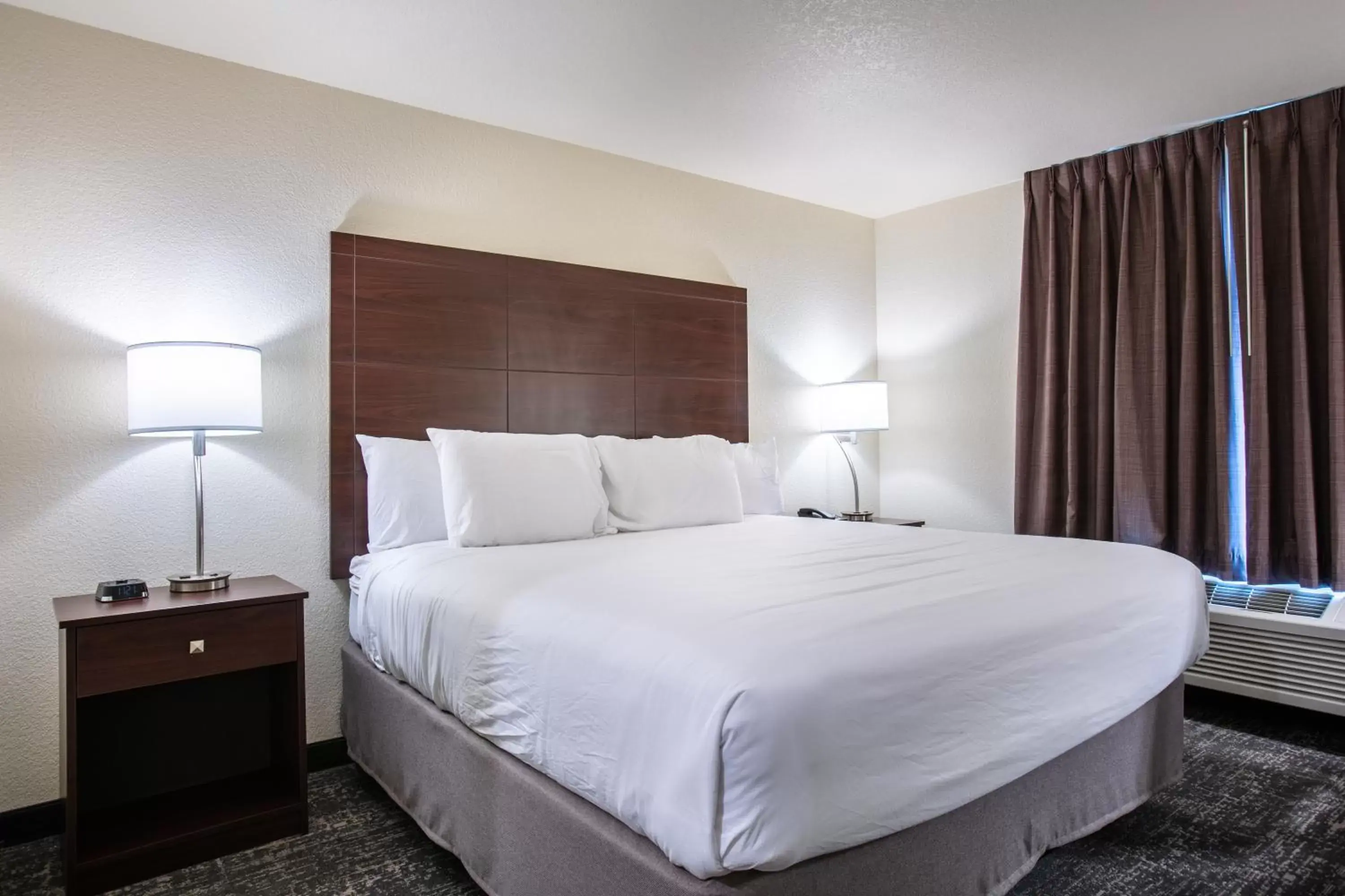 Bed in Cobblestone Inn & Suites - Pine Bluffs