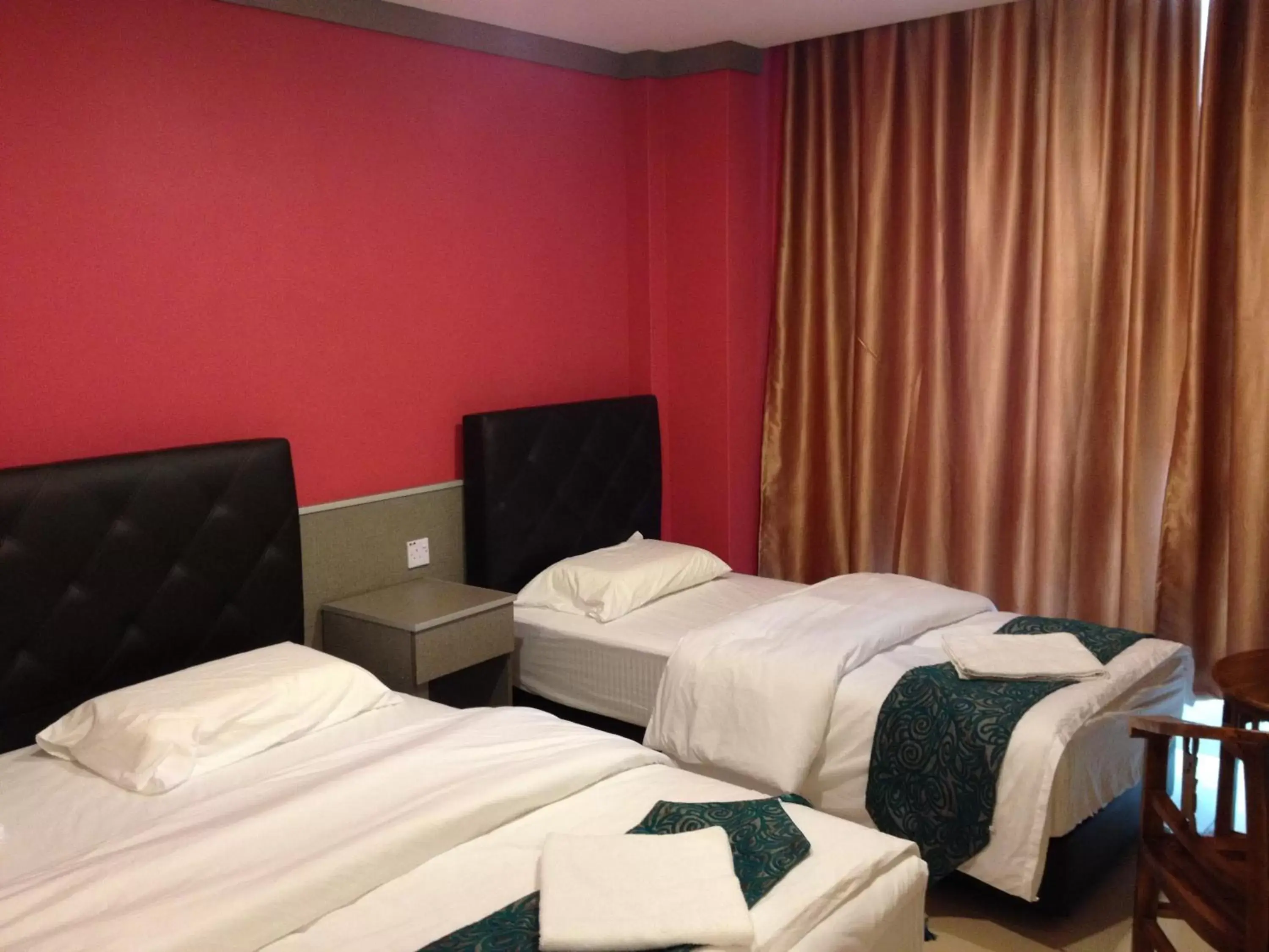 Bed in AERO Star Hotel