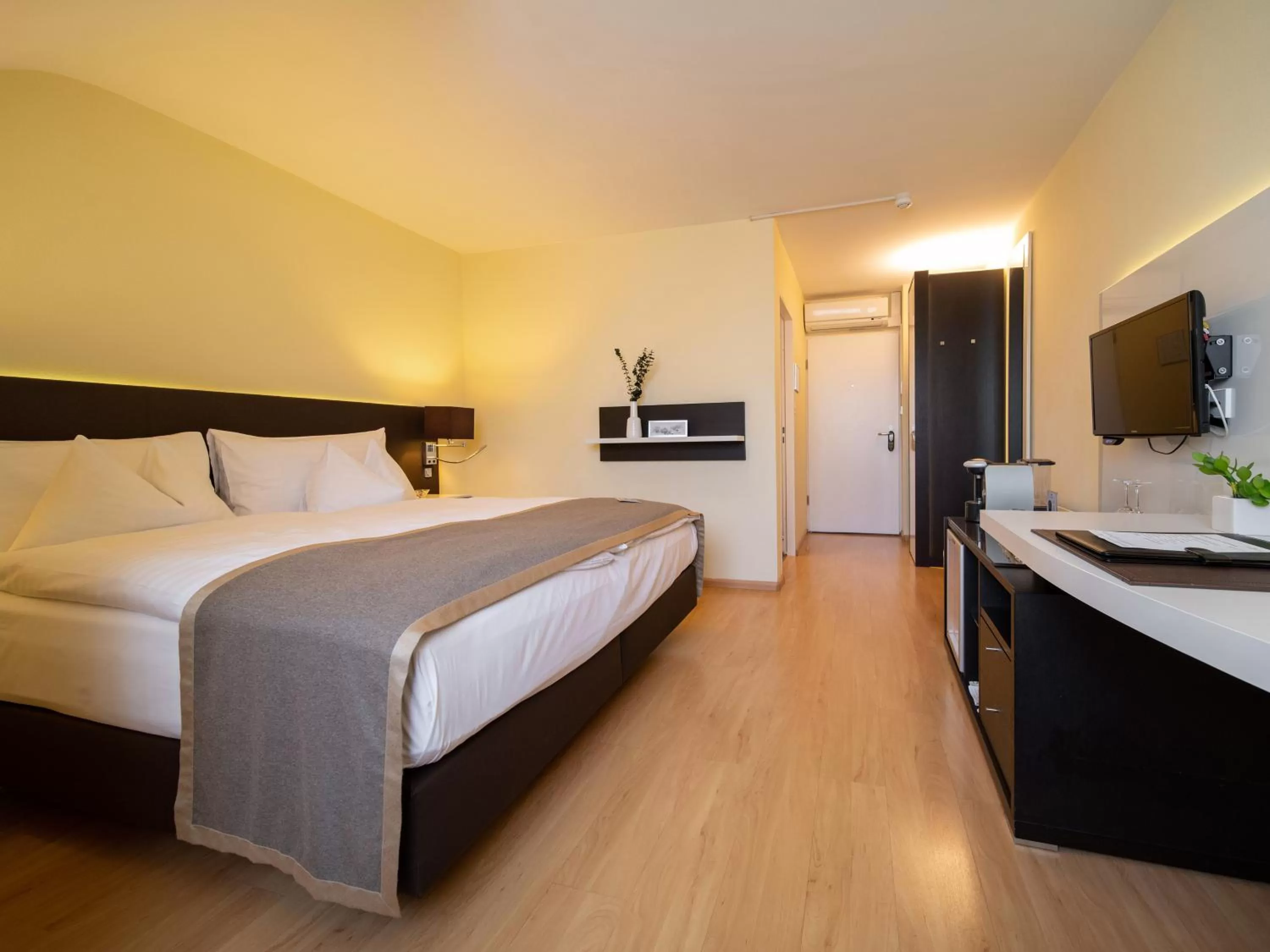 Bed in Hotel Spalentor - Ihr sympathisches Stadthotel