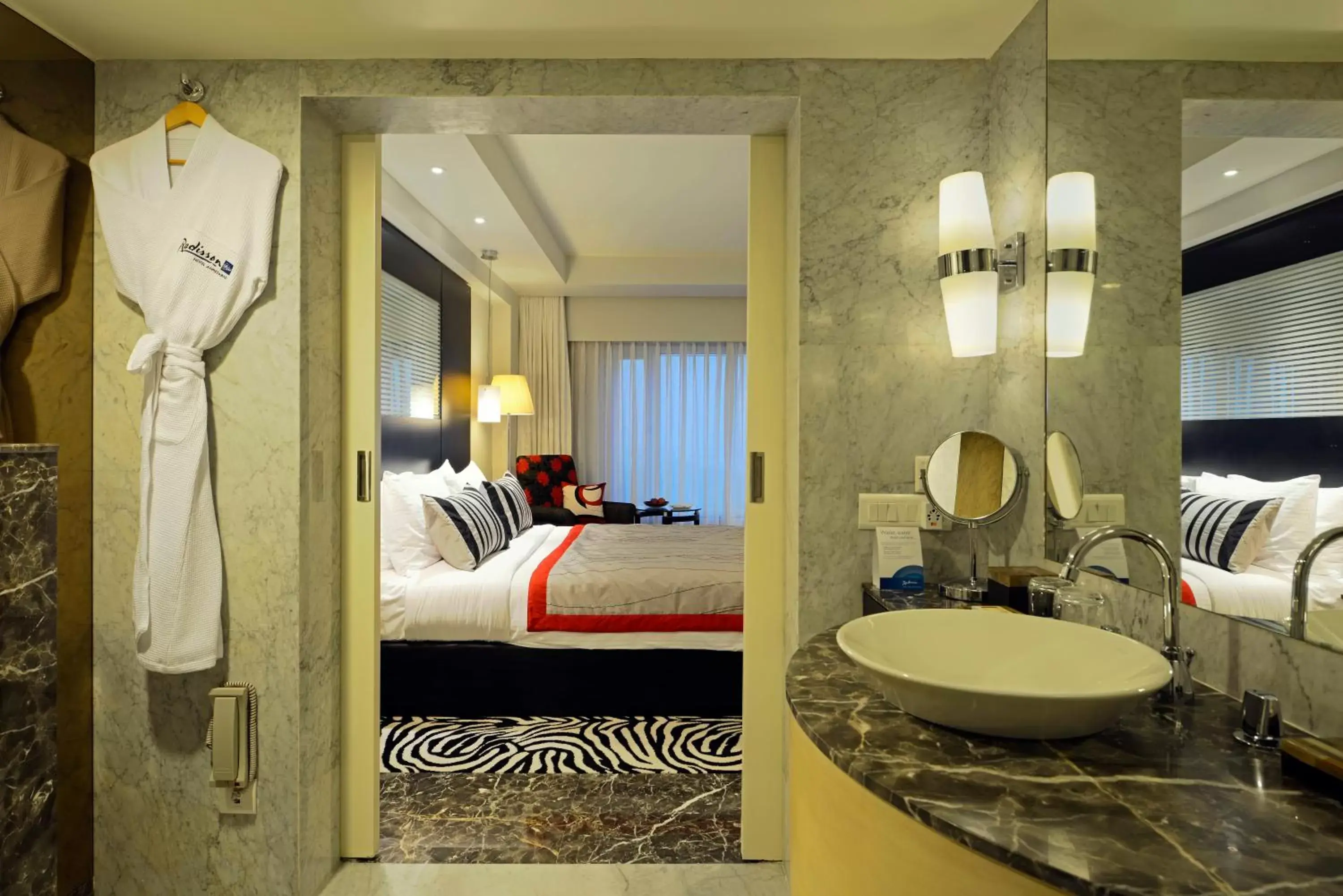 Photo of the whole room, Bathroom in Radisson Blu Hotel Ahmedabad