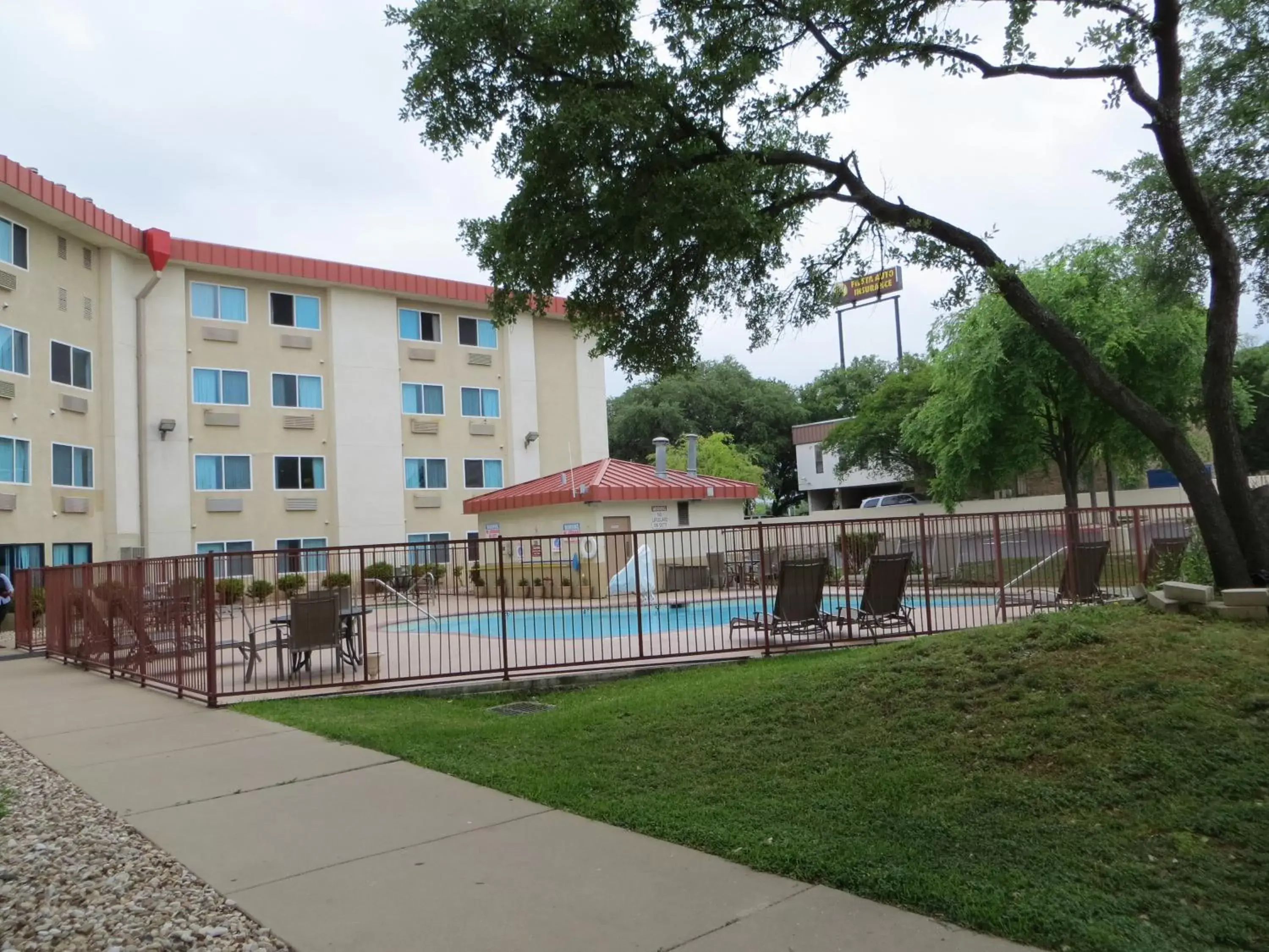 Swimming pool, Property Building in Super 8 by Wyndham Austin North/University Area