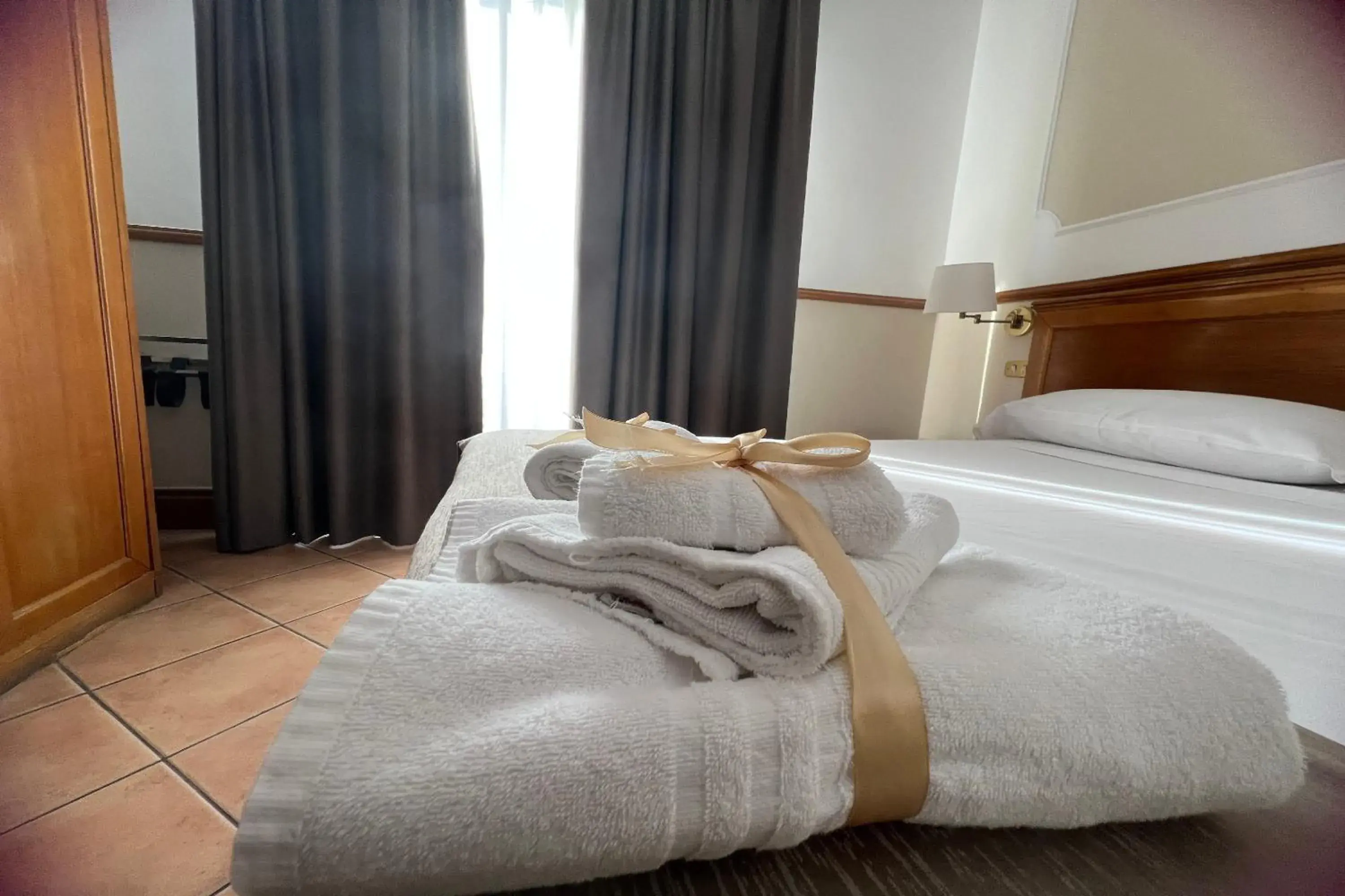 Bed in Hotel Leopardi