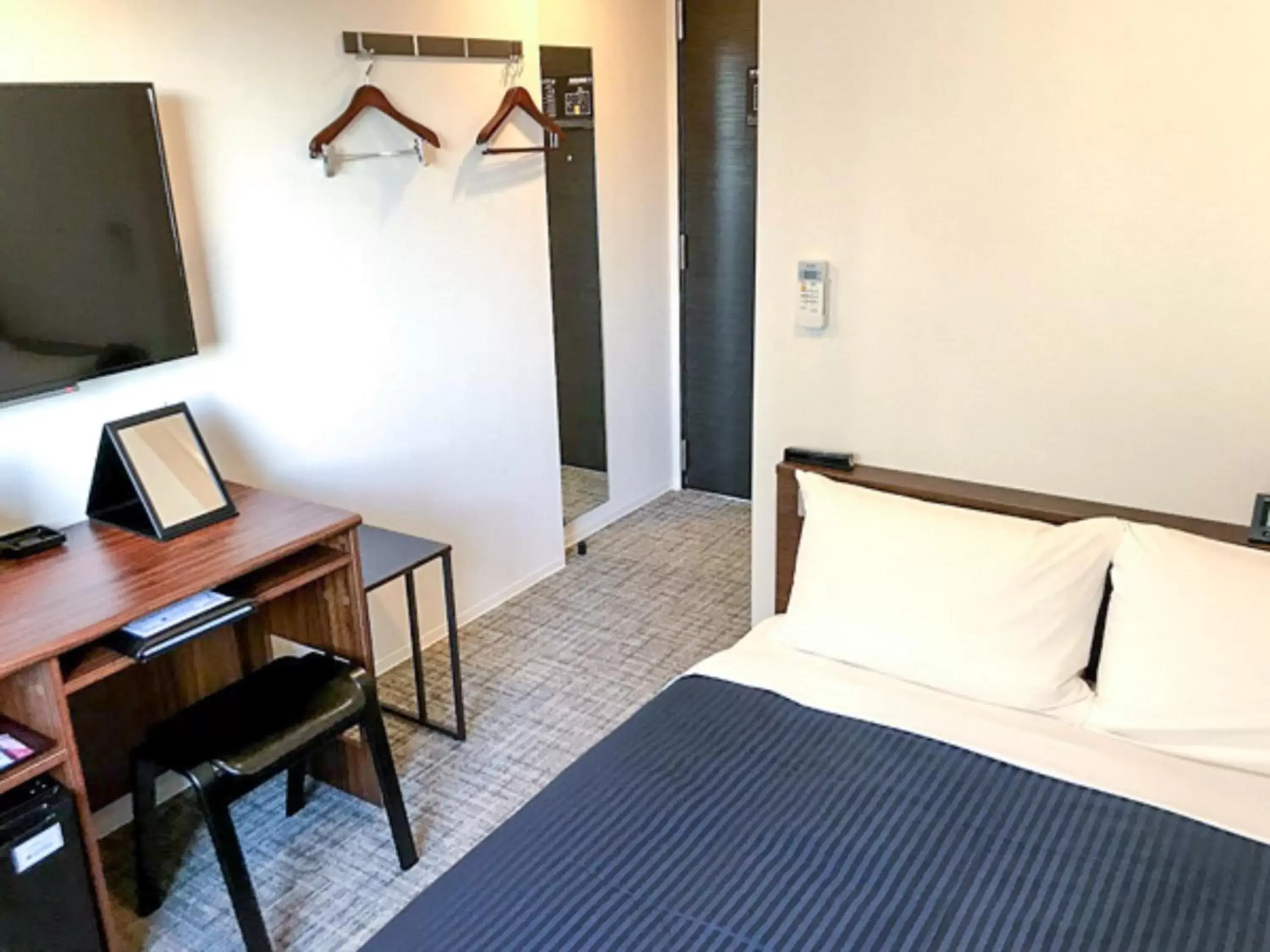 Bed in HOTEL LiVEMAX Chiba Soga-Ekimae Bed in HOTEL LiVEMAX Chiba Soga-Ekimae