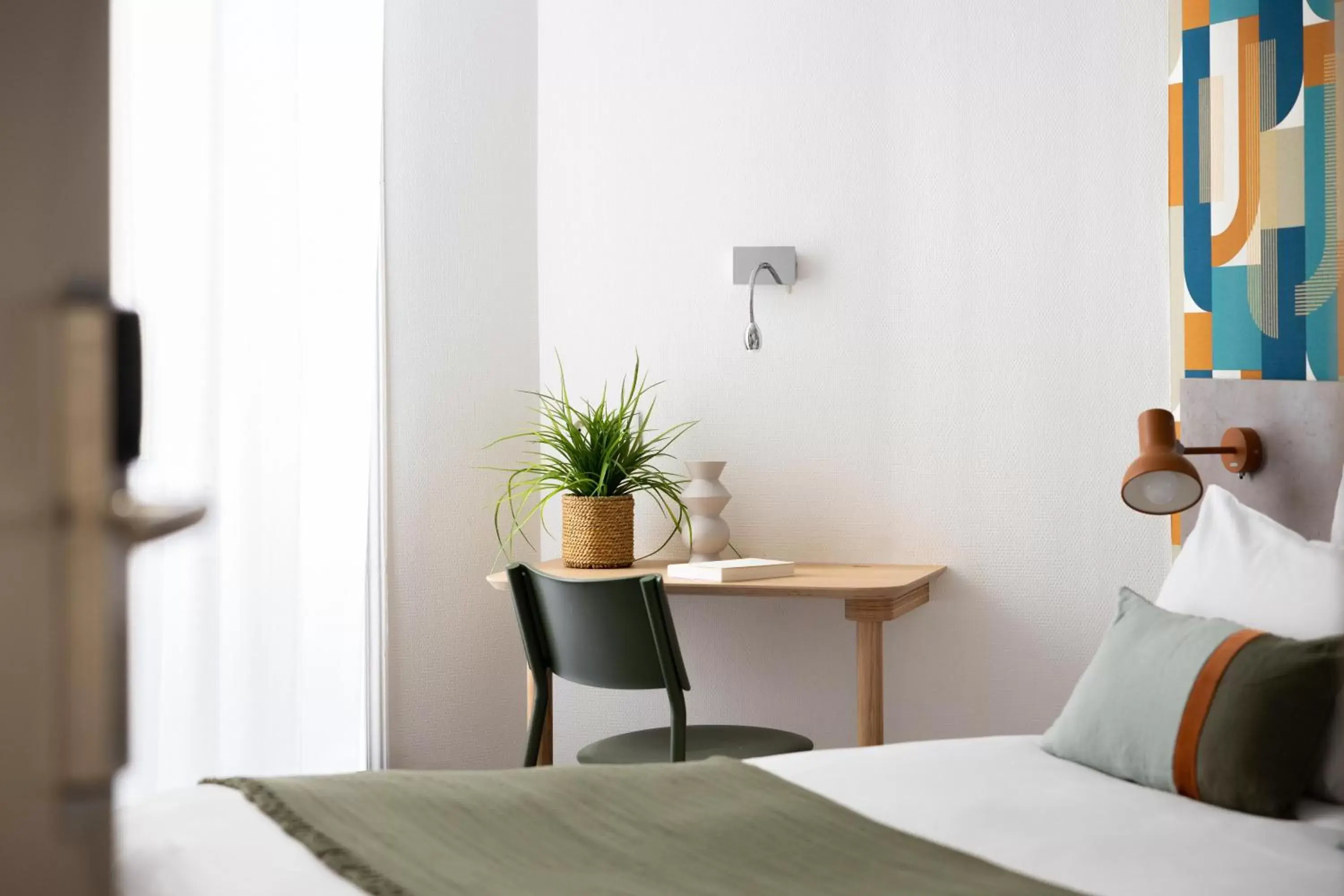 Bedroom in Hôtel l'Univers