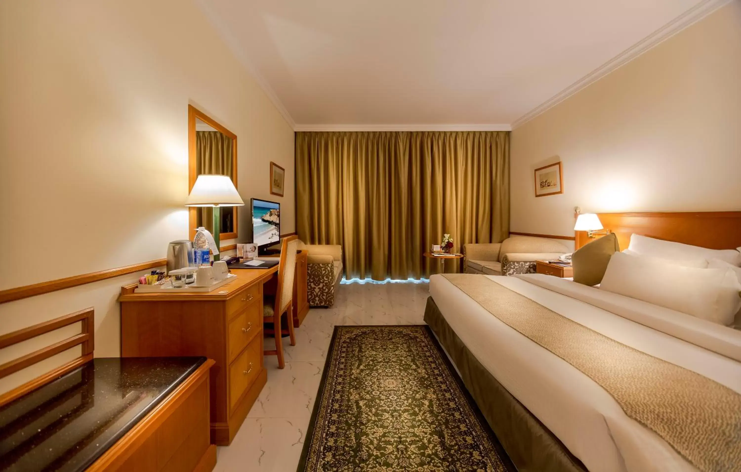 Bedroom in Golden Tulip Nizwa Hotel