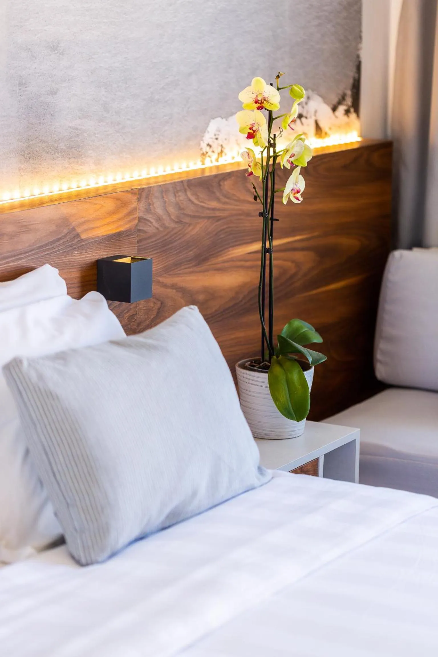 Bed in Atrium Ambiance Hotel