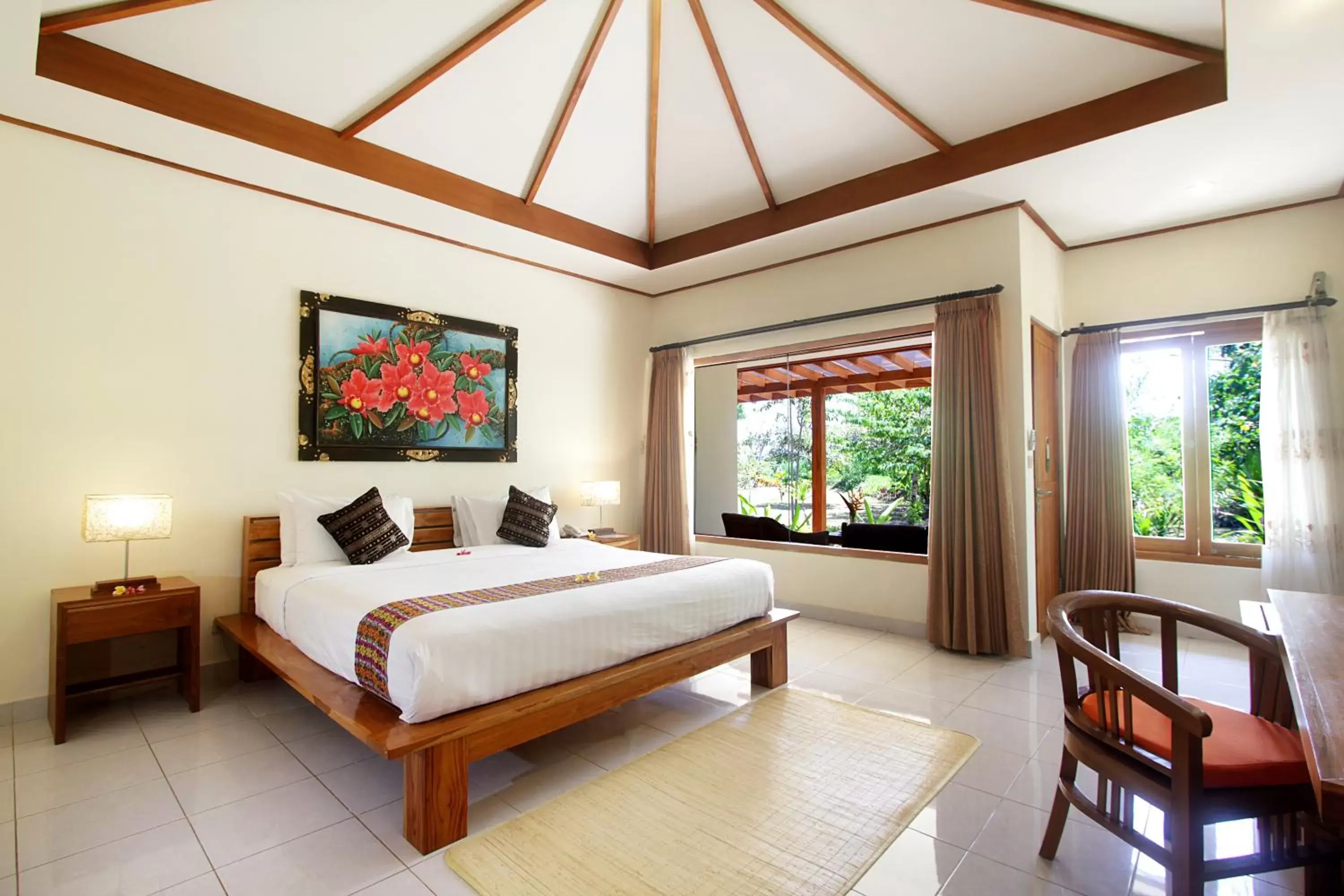 Bedroom in Puri Sari Beach Hotel
