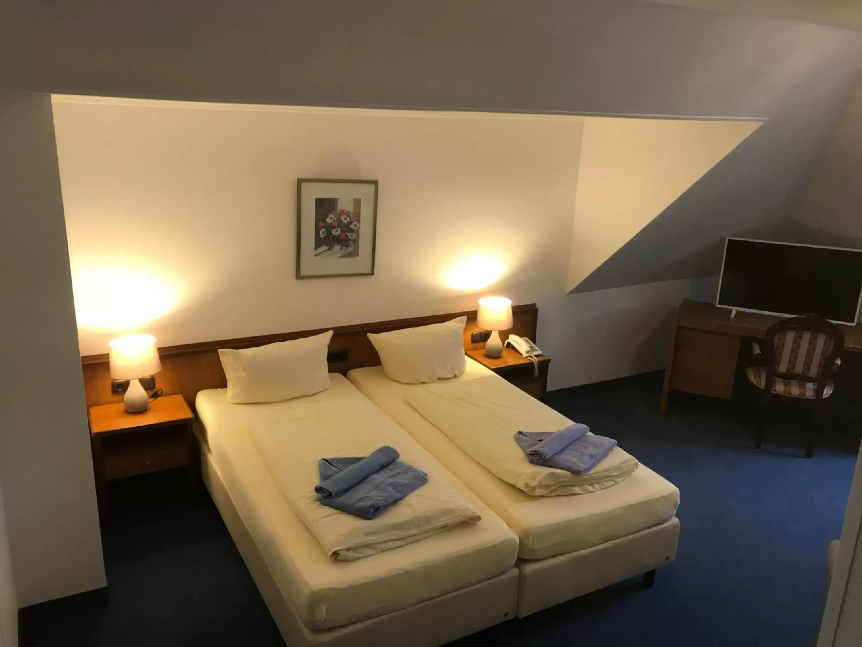 Bed in Hotel Kaiserhof Deluxe