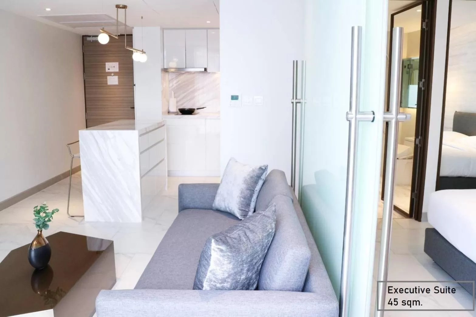 Living room, Bed in ashley hotel bkk