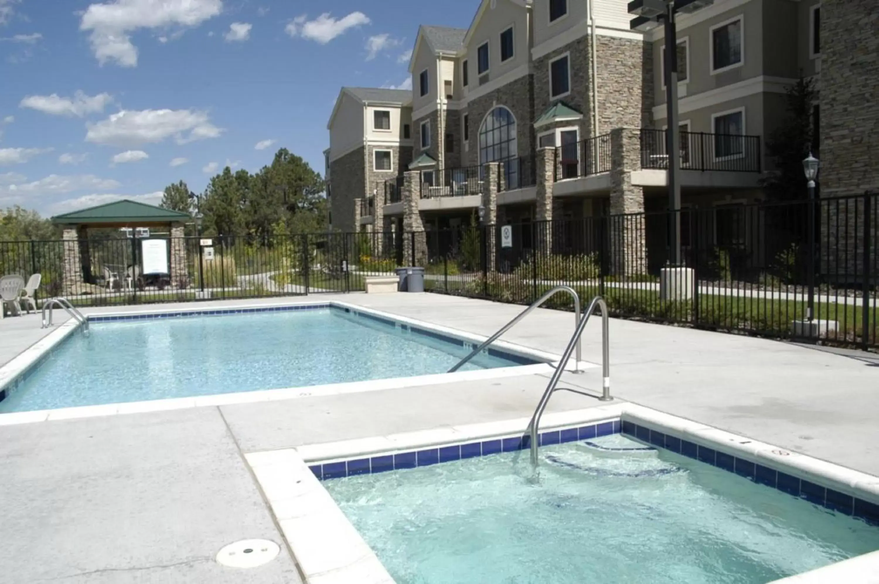 Swimming Pool in Staybridge Suites Colorado Springs North, an IHG Hotel