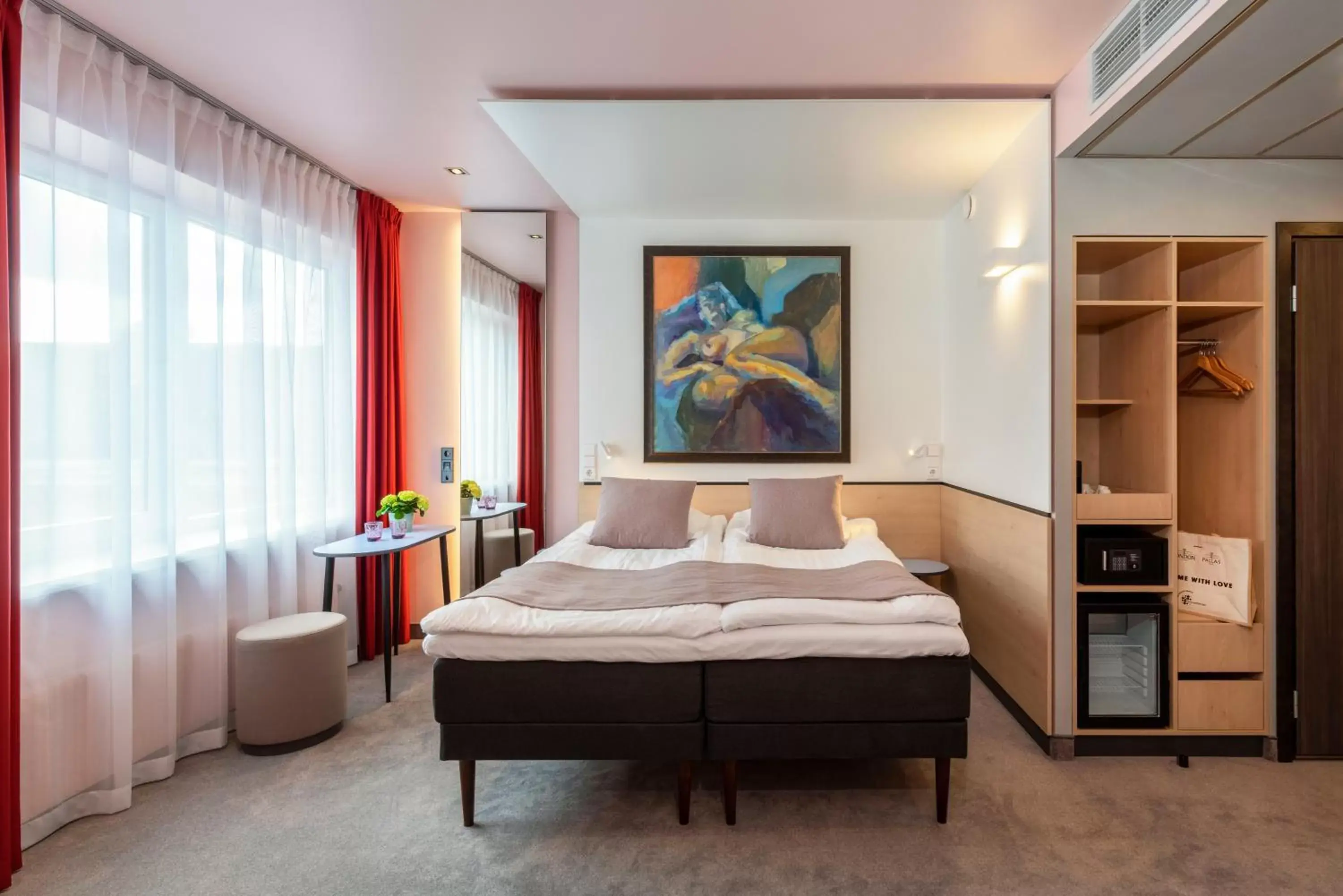 Bed in Art Hotel Pallas by Tartuhotels
