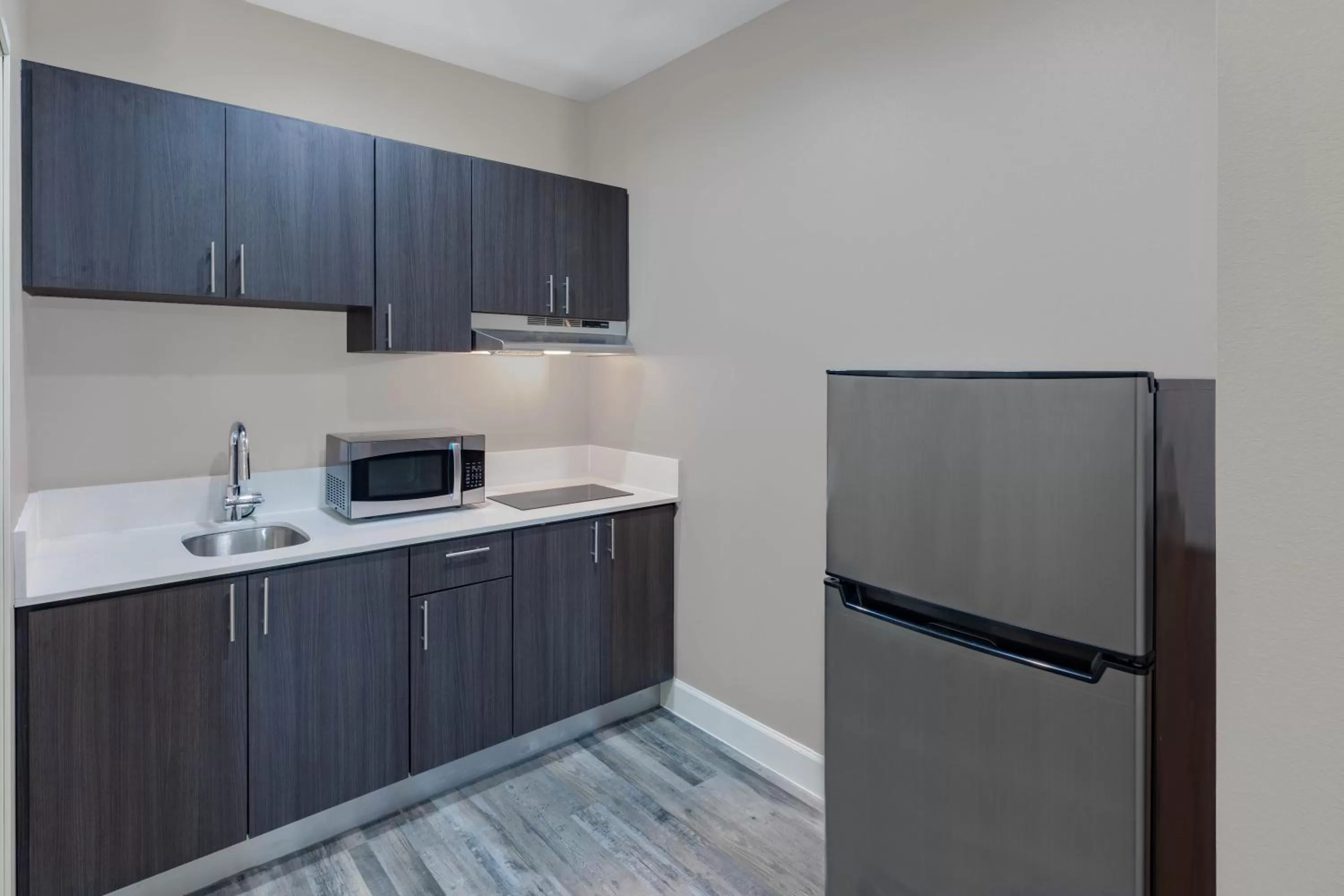 Kitchen or kitchenette in Super 8 by Wyndham Houston NW Beltway 8-West Rd