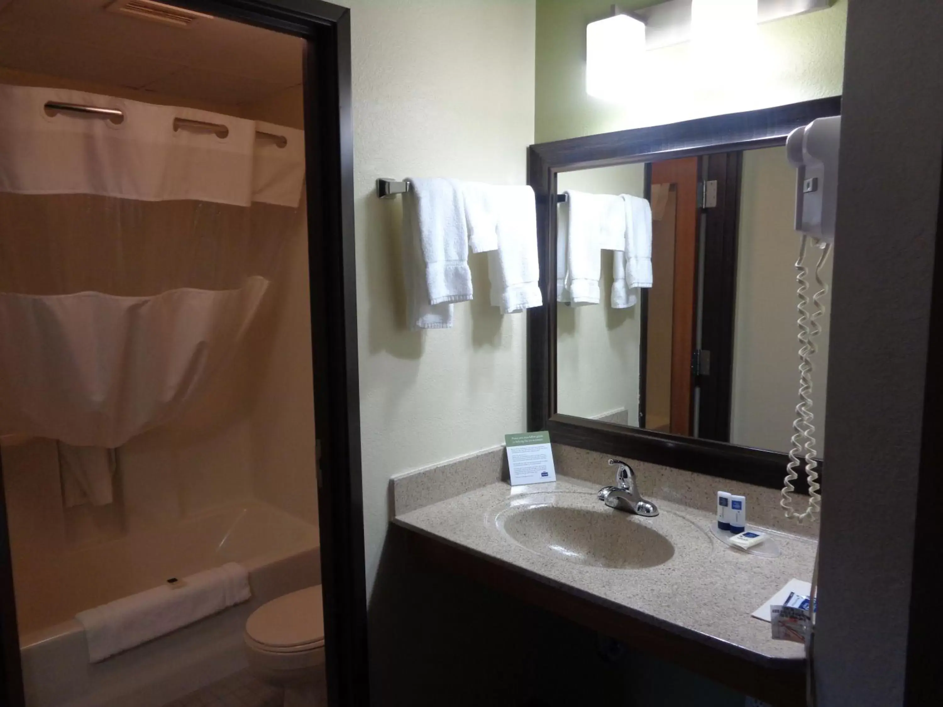 Bathroom in AmericInn by Wyndham Grand Rapids