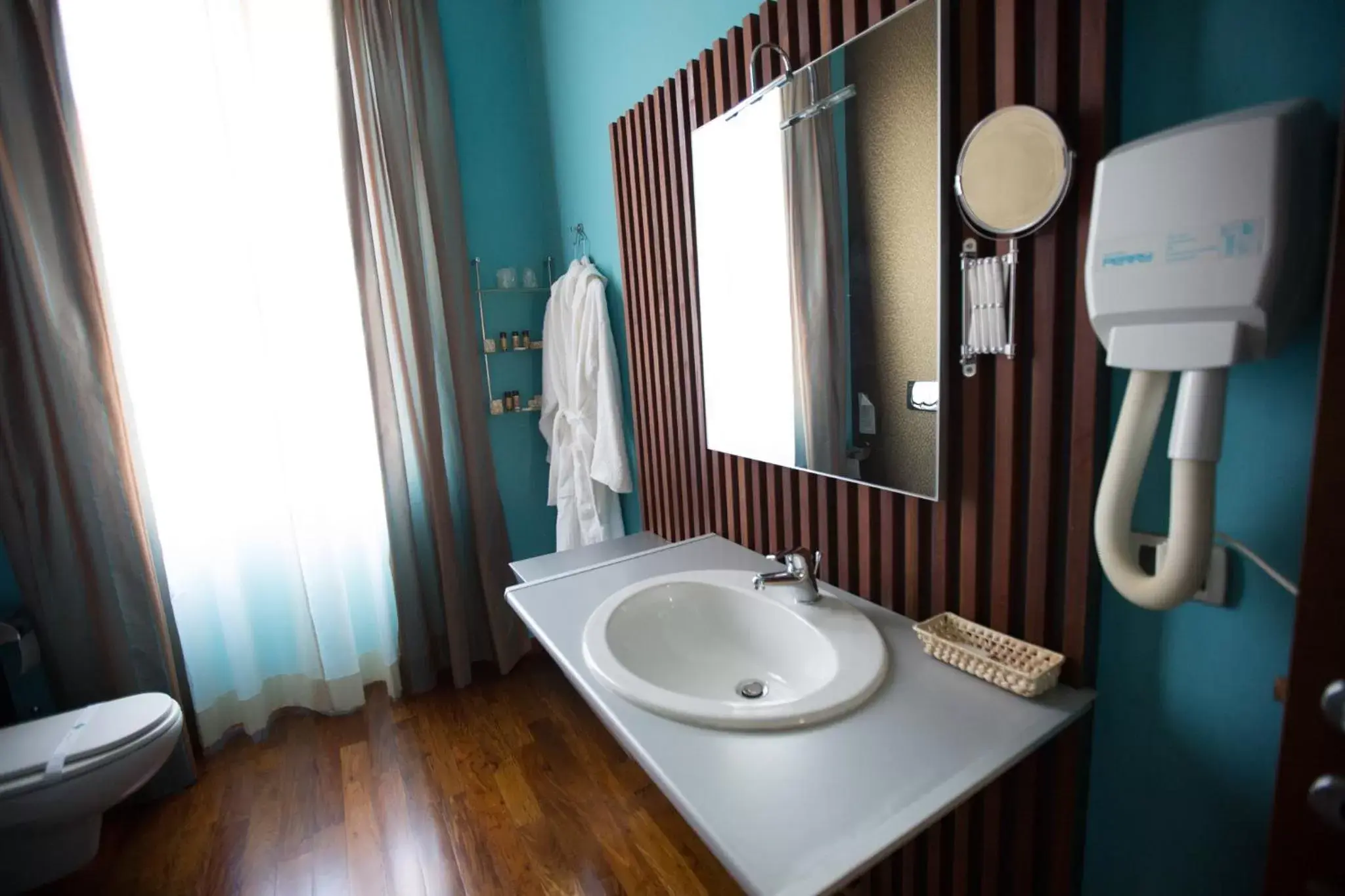 Bathroom in Hotel Dei Pittori