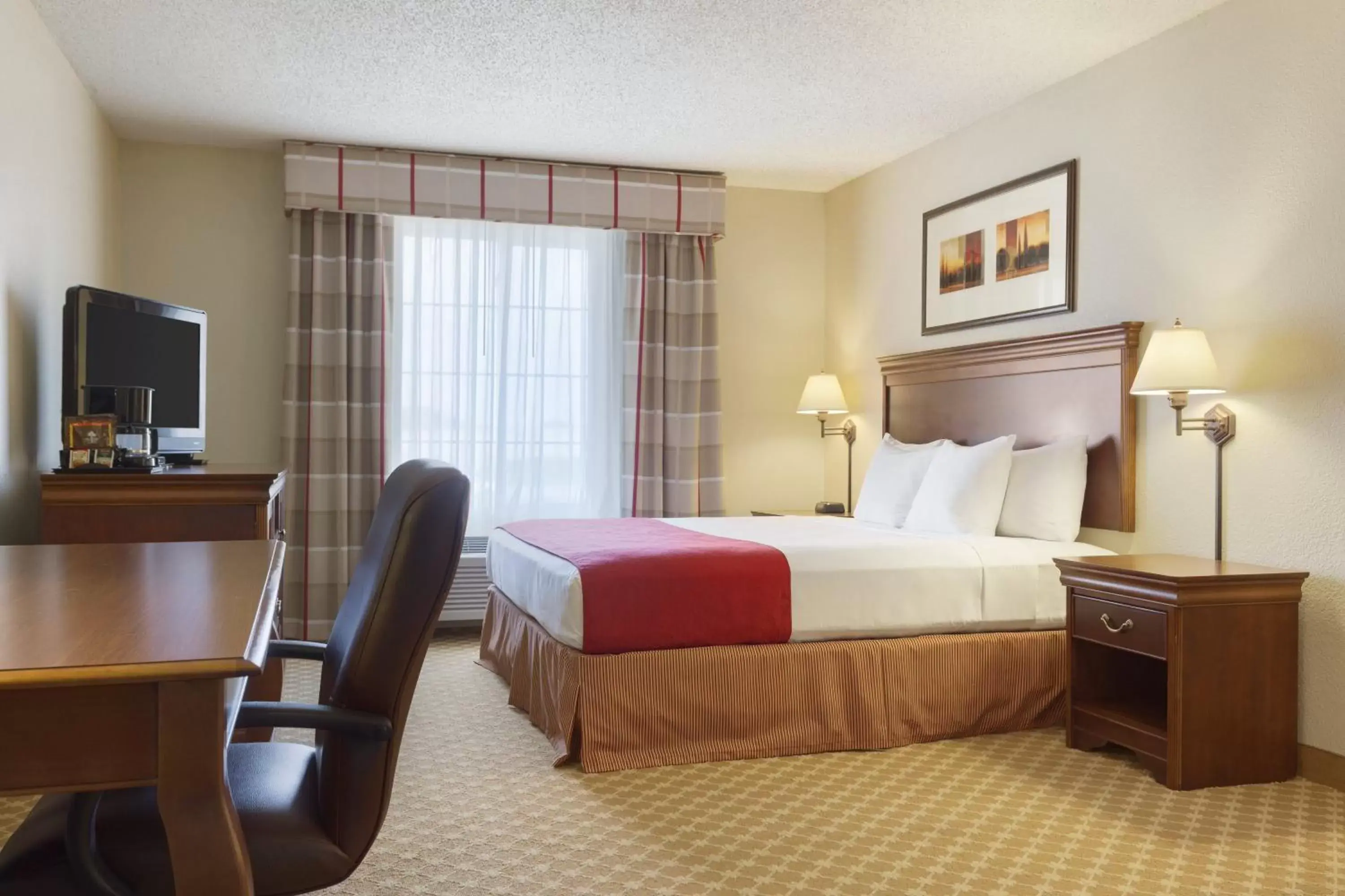 Photo of the whole room, Bed in Country Inn & Suites by Radisson, Nevada, MO