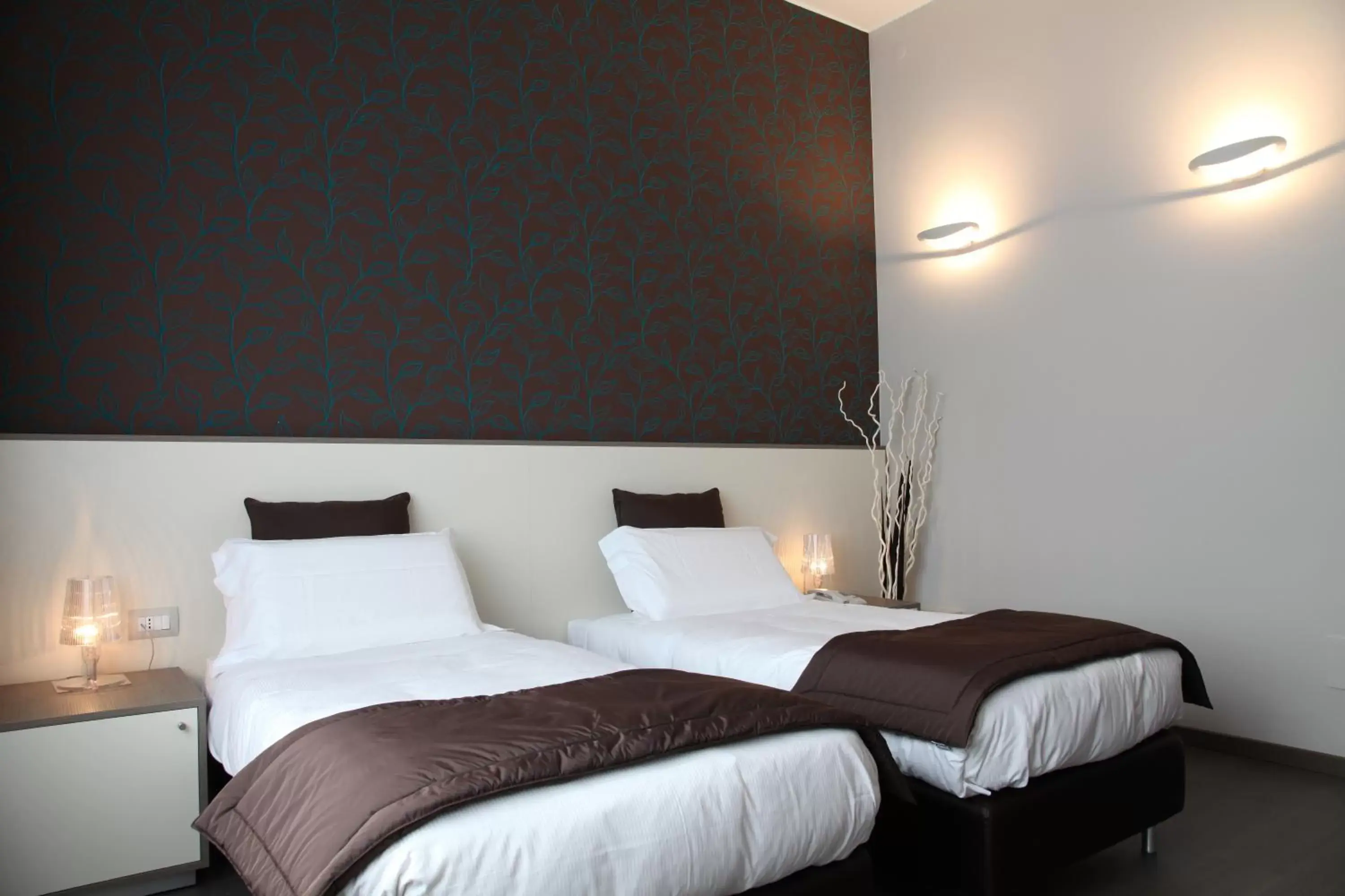 Bed in Hotel Tiziano - Gruppo Mini Hotel Bed in Hotel Tiziano - Gruppo Mini Hotel