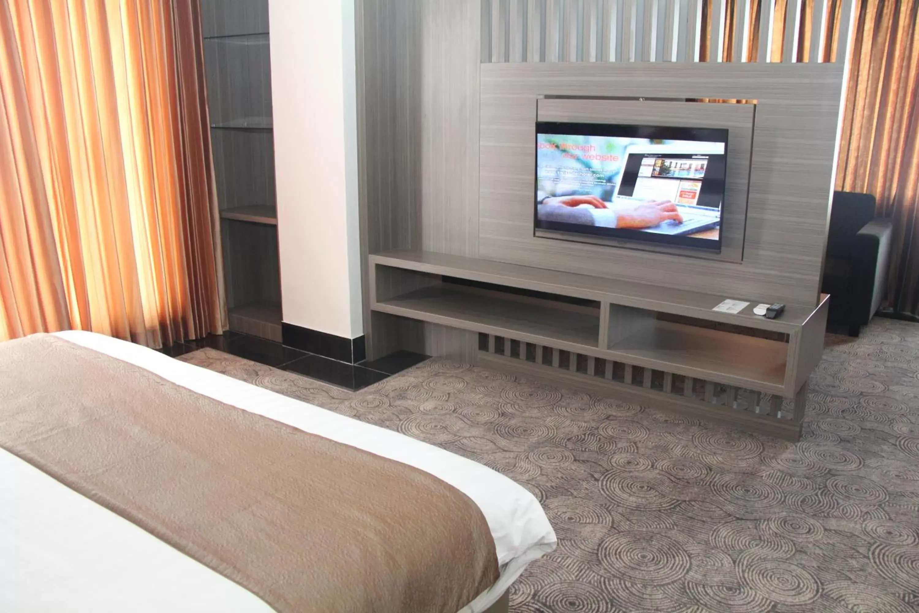 TV and multimedia, TV/Entertainment Center in Swiss-Belhotel Borneo Samarinda
