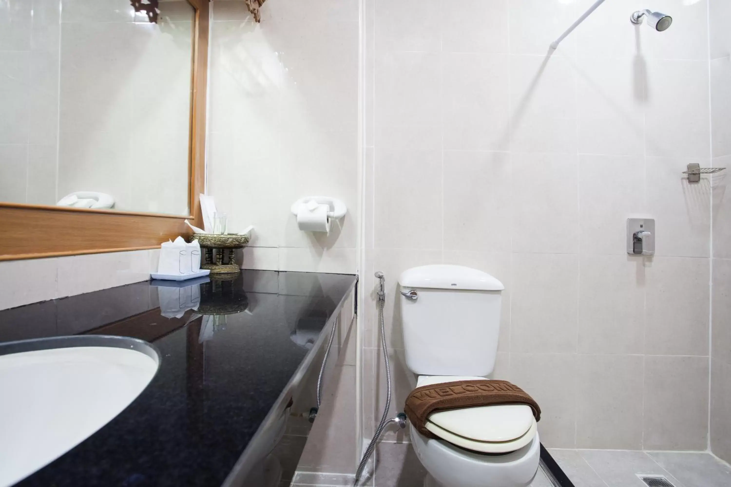 Bathroom in Diana Garden Resort - SHA Extra Plus