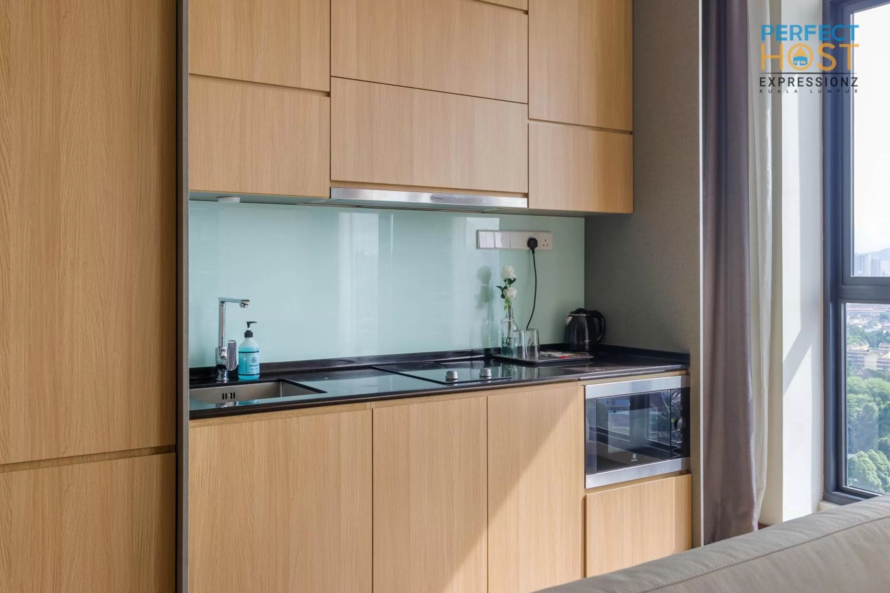 Kitchen or kitchenette in Expressionz Suites KL by Perfect Host