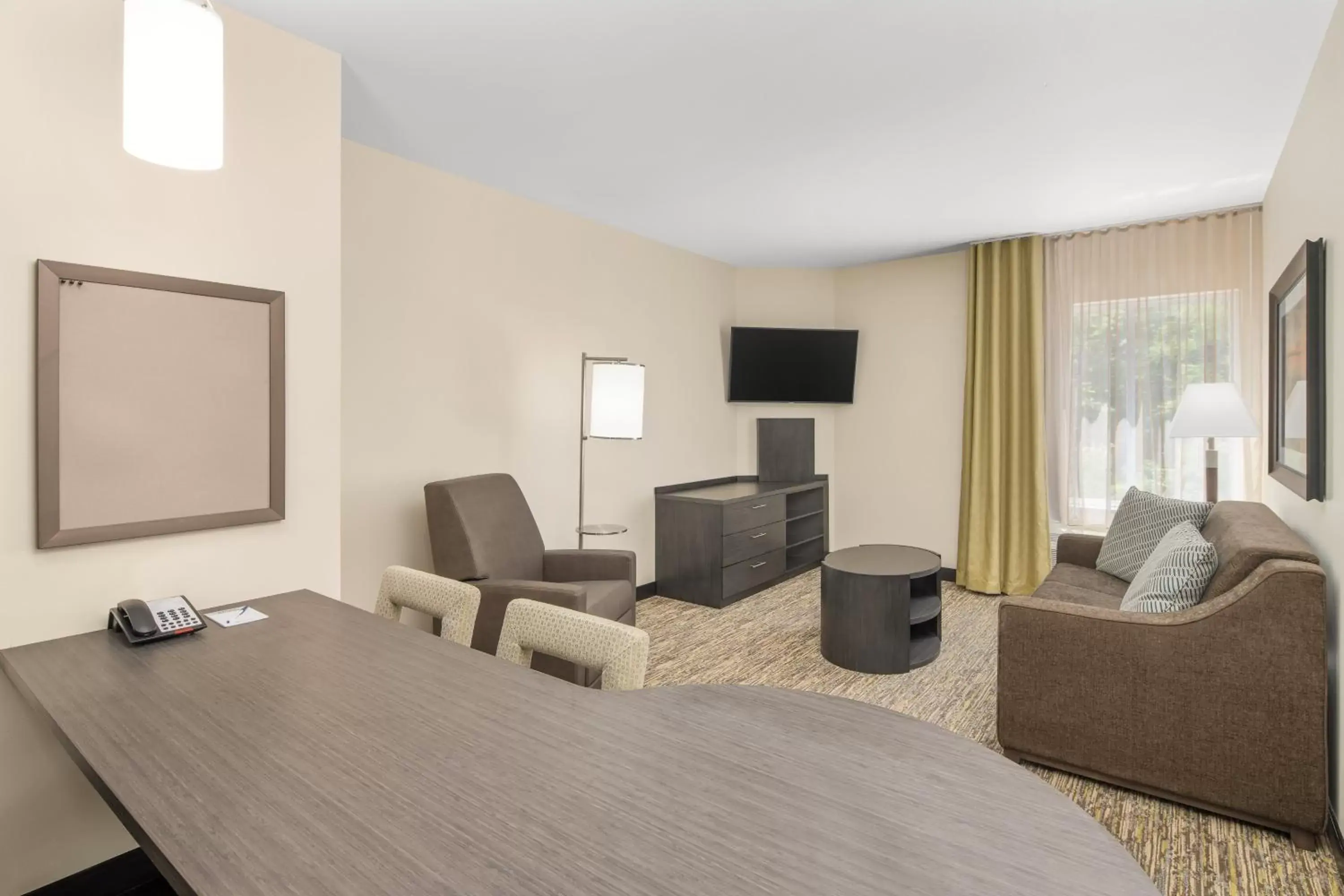 Photo of the whole room, Seating Area in Candlewood Suites - Newnan - Atlanta SW, an IHG Hotel