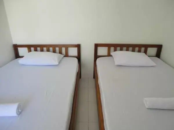 Bed in Jazz Senggigi Hotel