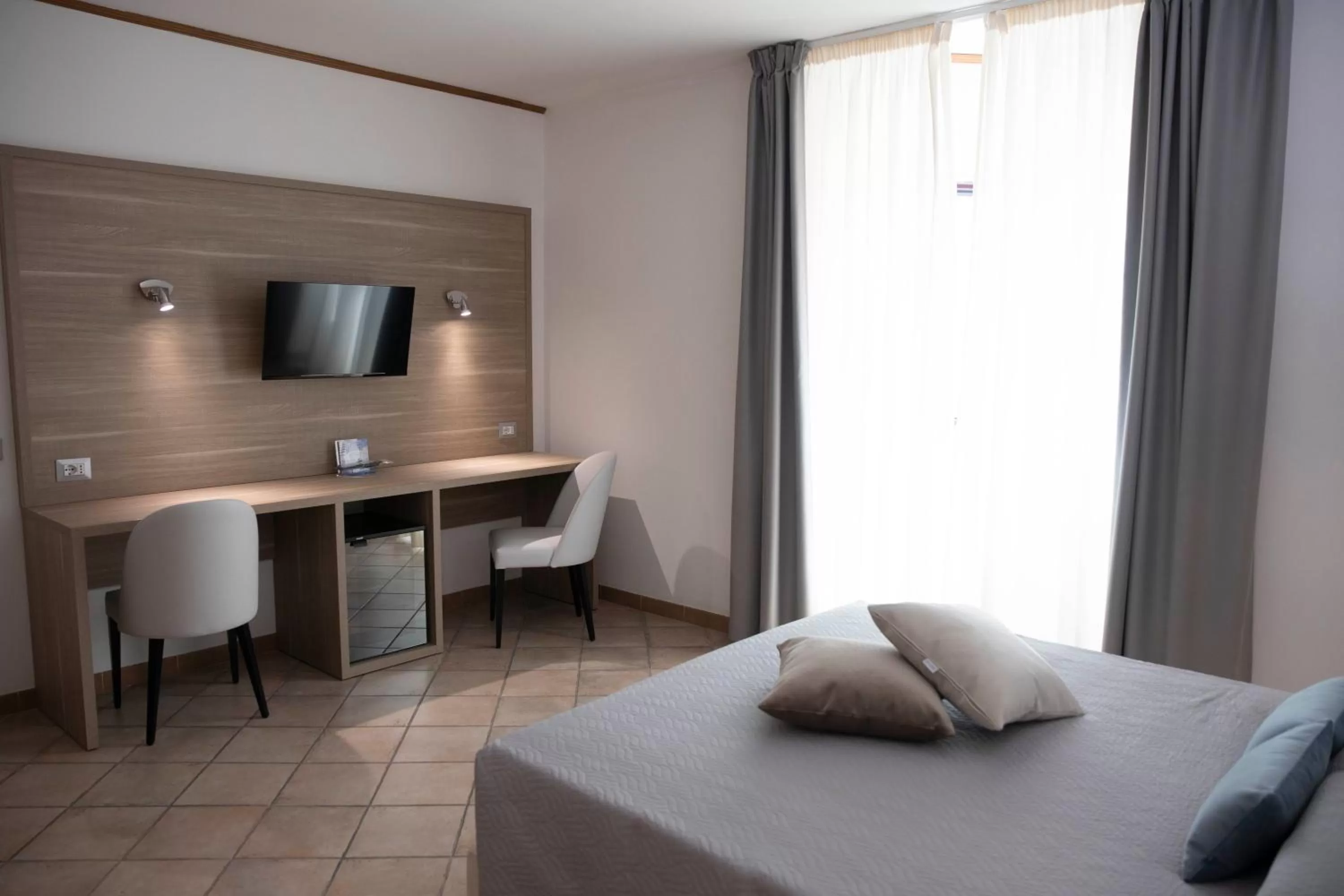 Bed in Pegasus Hotel