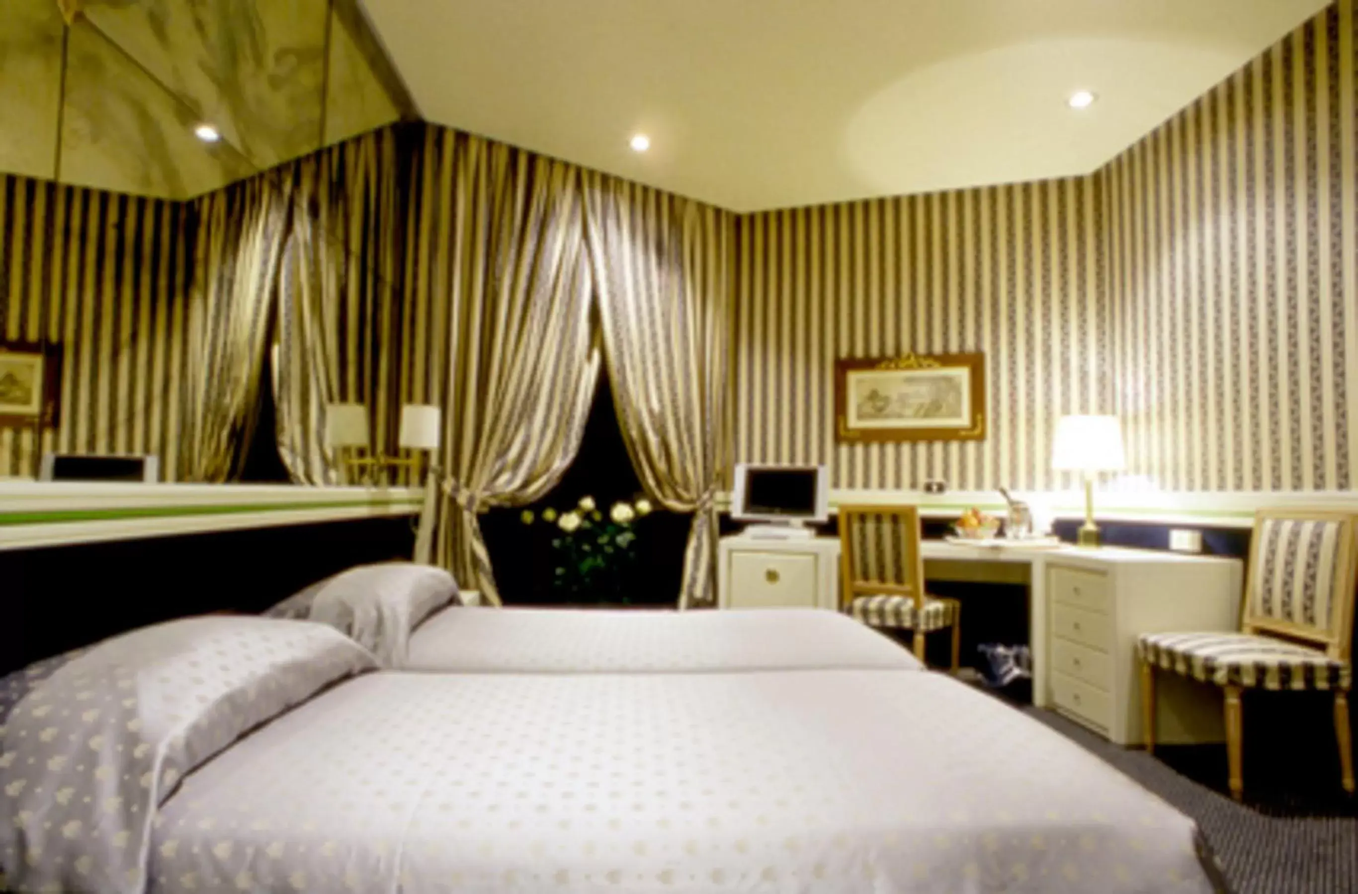 Bedroom in Atlante Star Hotel
