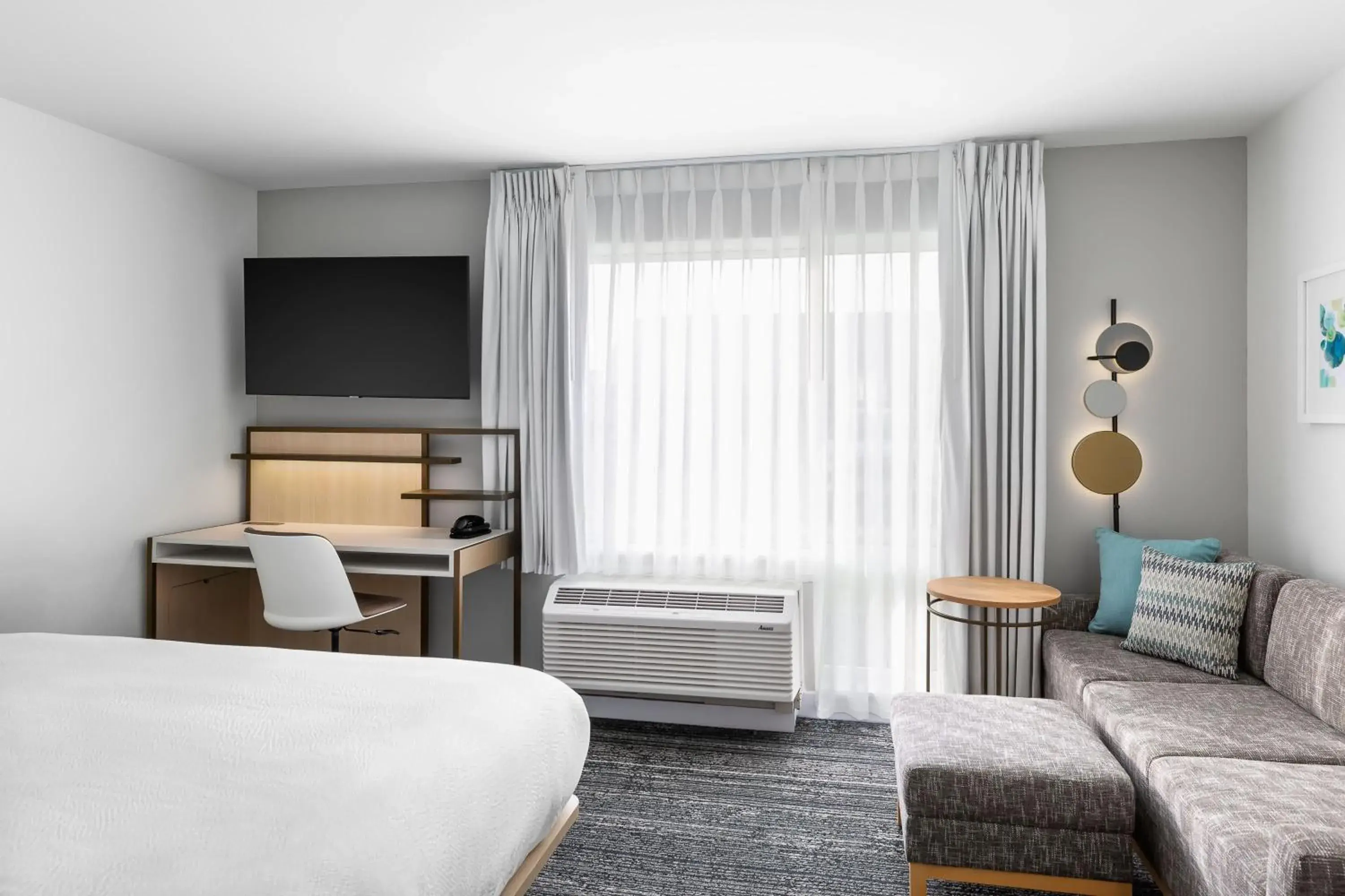 Bedroom, Seating Area in TownePlace Suites by Marriott Iron Mountain