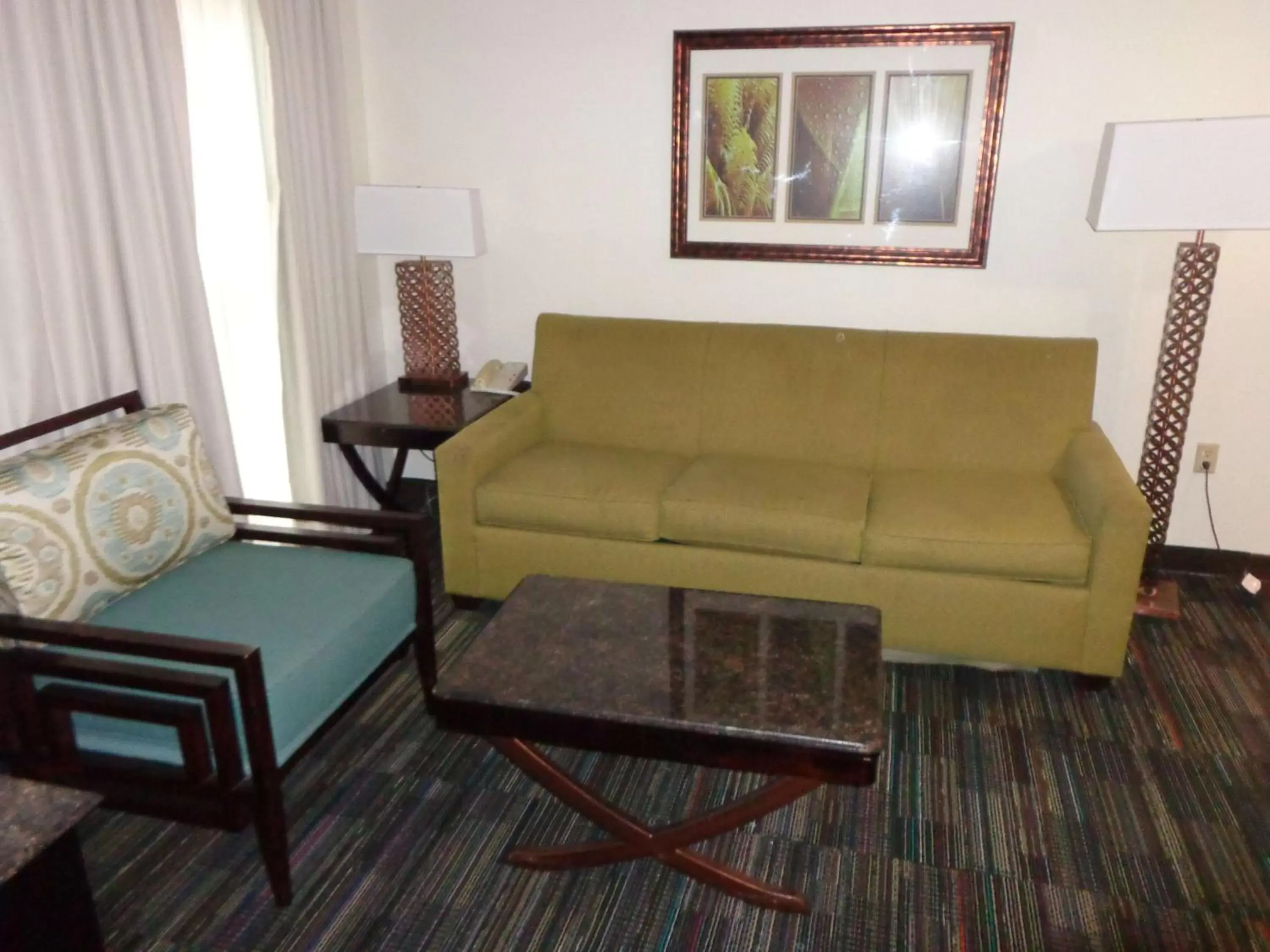 Photo of the whole room, Seating Area in SureStay Plus by Best Western Orlando Lake Buena Vista