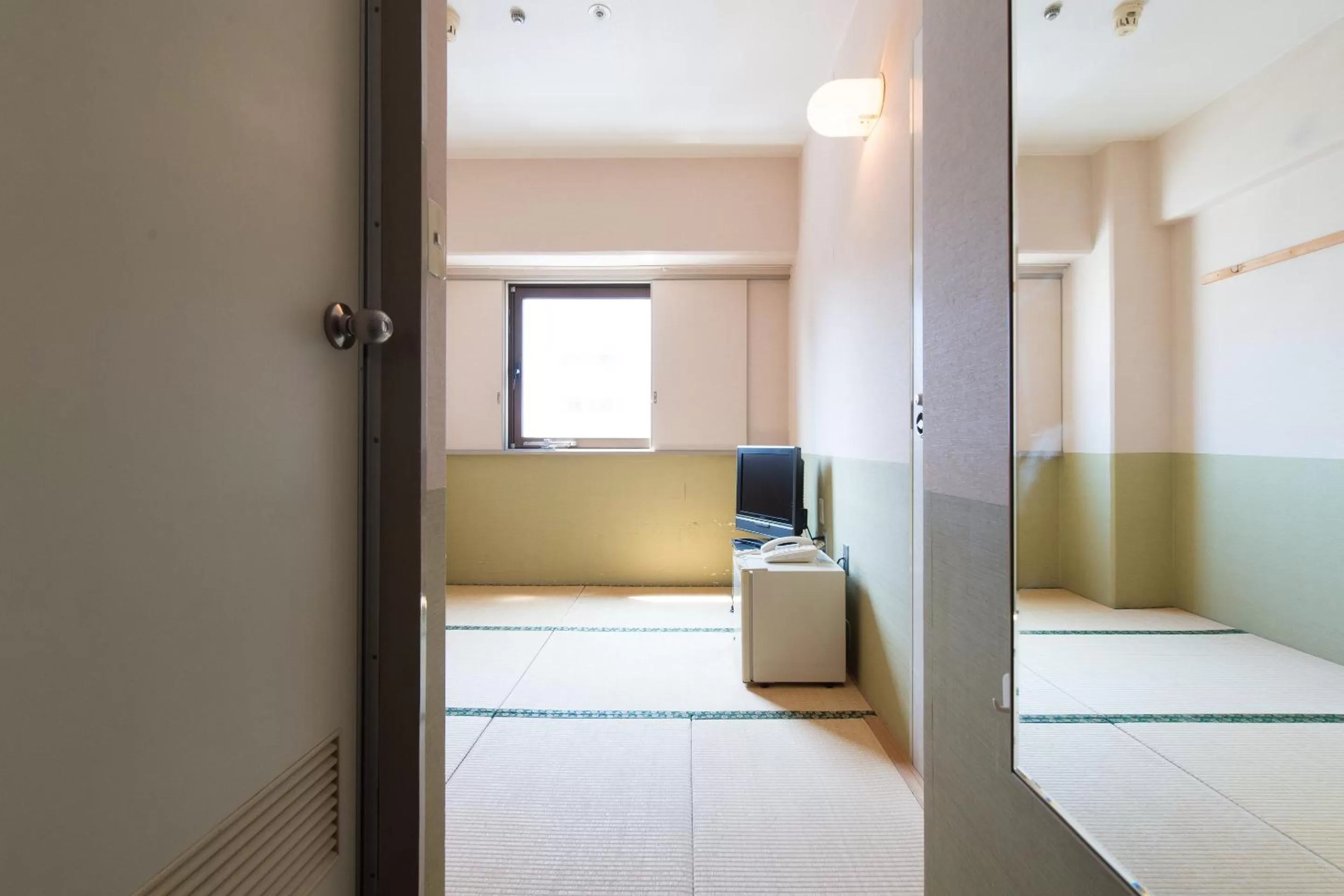 Photo of the whole room, Bed in Tabist Hotel Tetora Kitakyushu