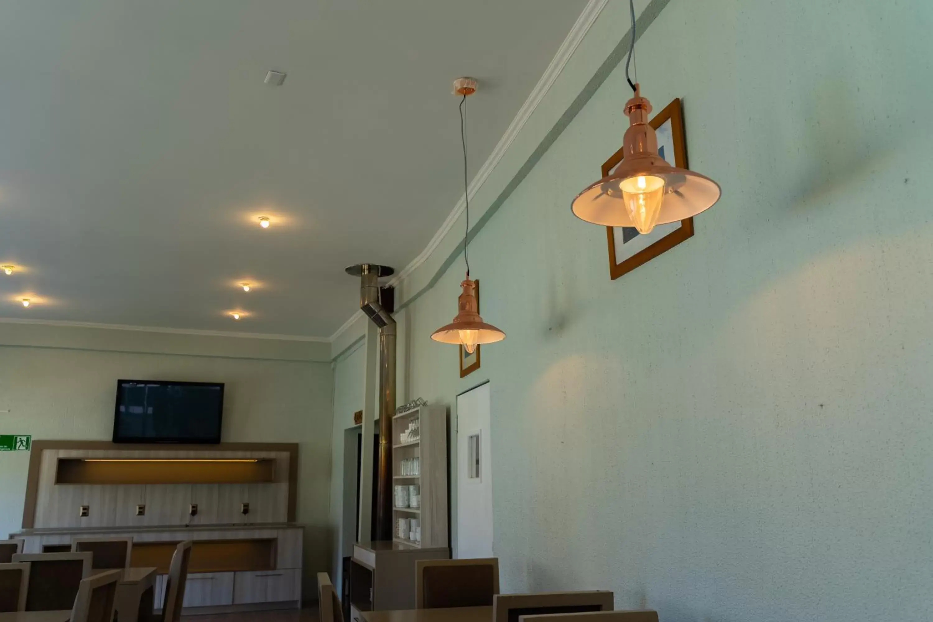 Communal lounge/ TV room in Hotel Palmas de La Serena