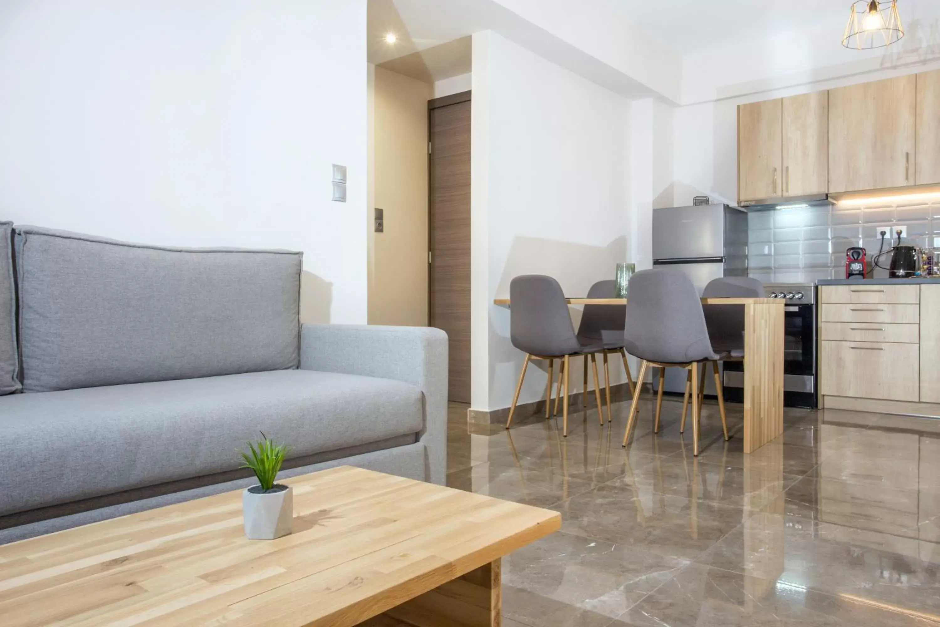 Living room, Dining Area in Vardians Villas & Suites