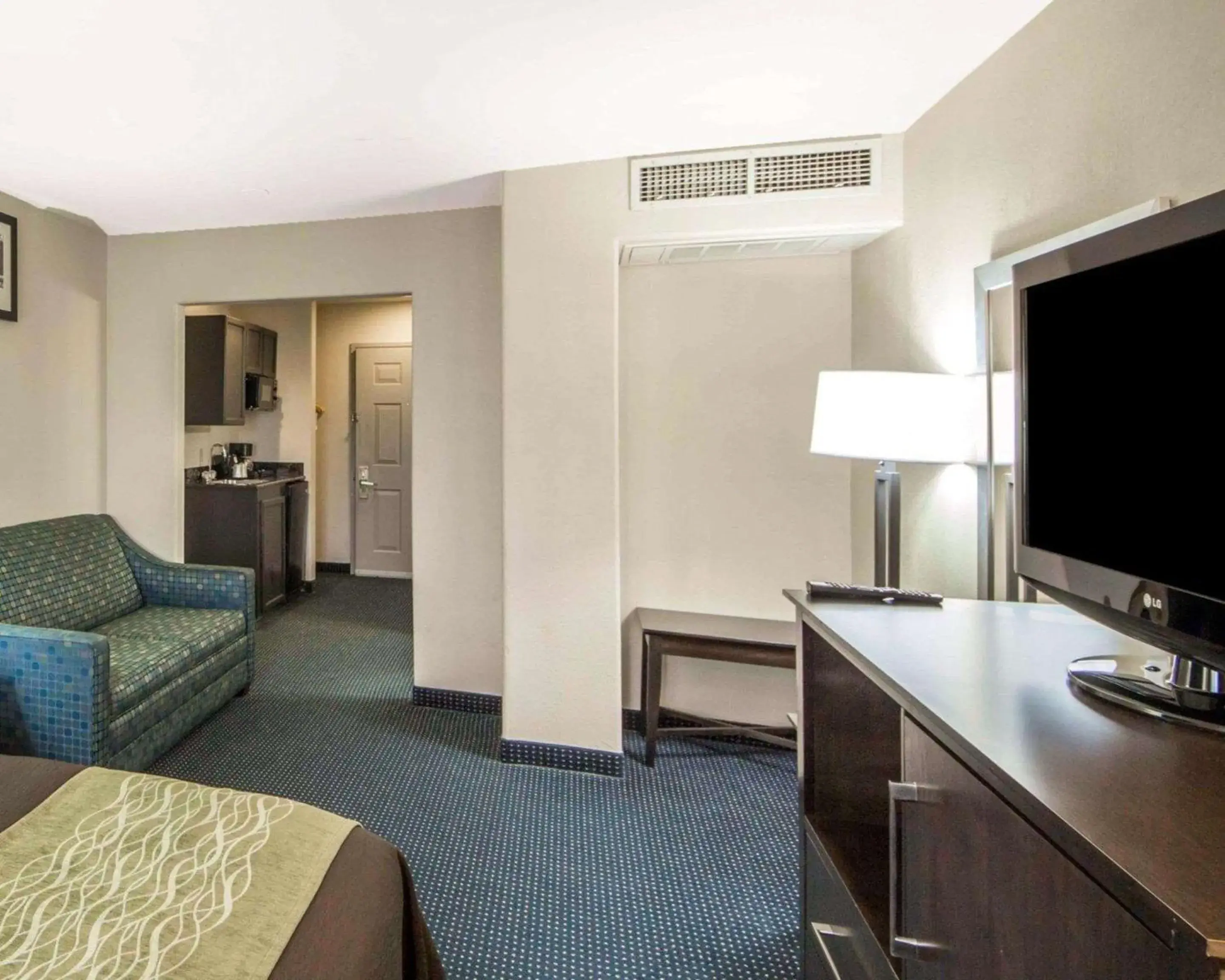 Photo of the whole room, TV/Entertainment Center in Quality Inn Tulsa-Downtown West