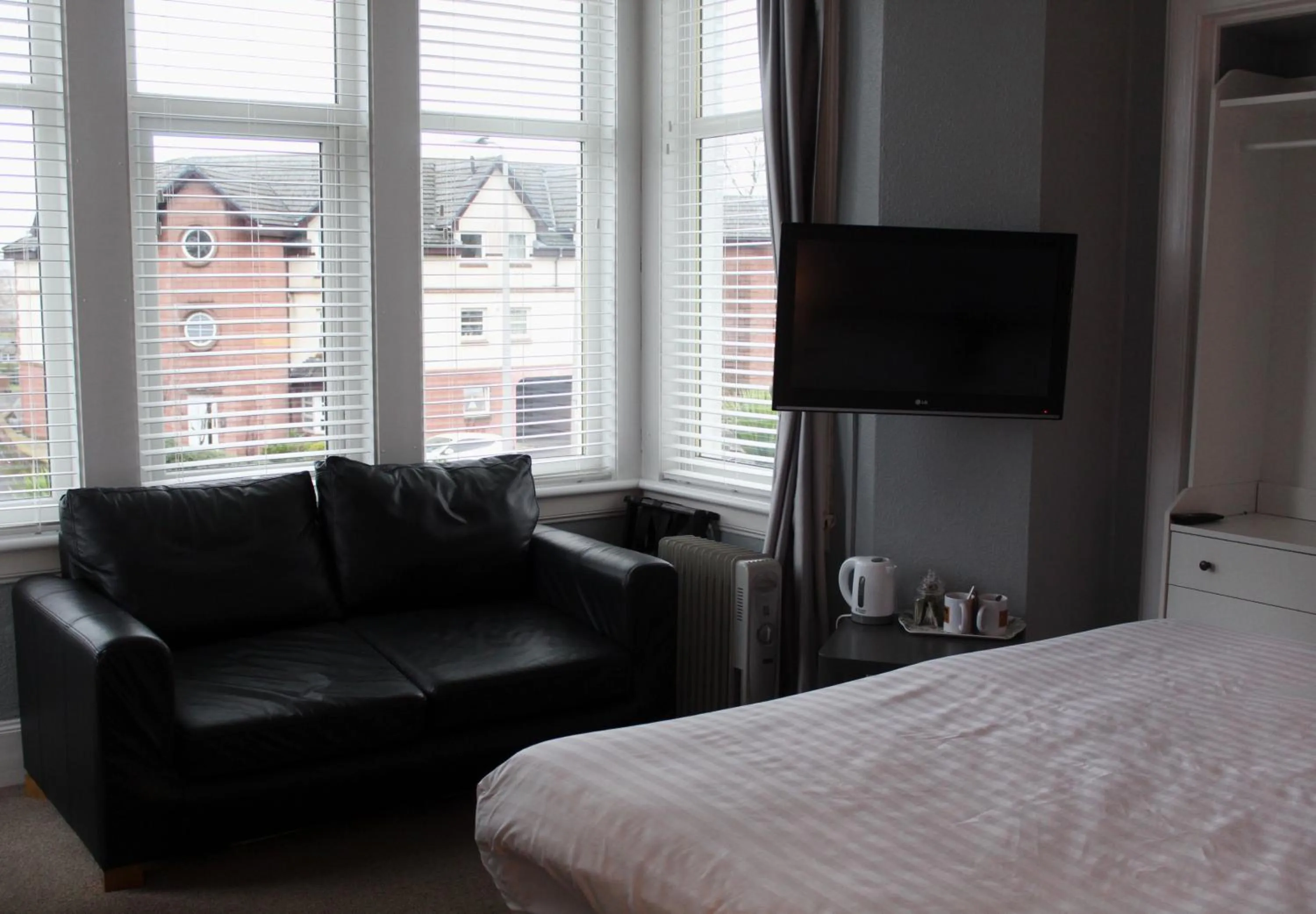 Bed in The Woodhouse Hotel