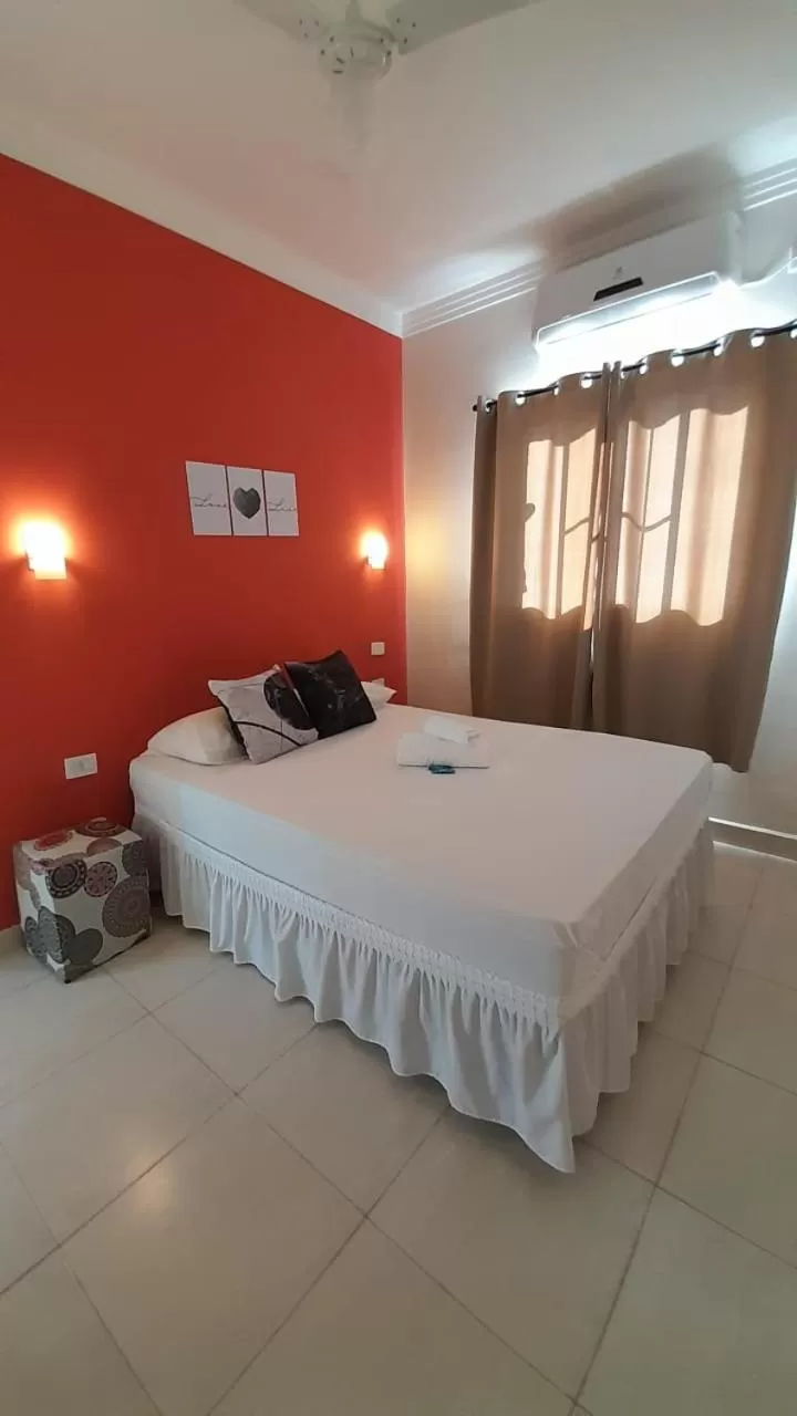 Bed in Pousada Recanto Som do Mar