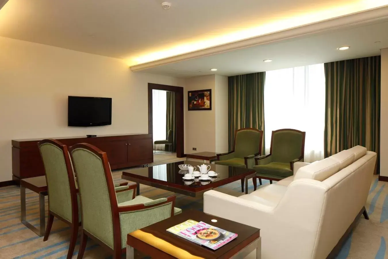 Communal lounge/ TV room, Seating Area in Holiday Inn Olaya, an IHG Hotel