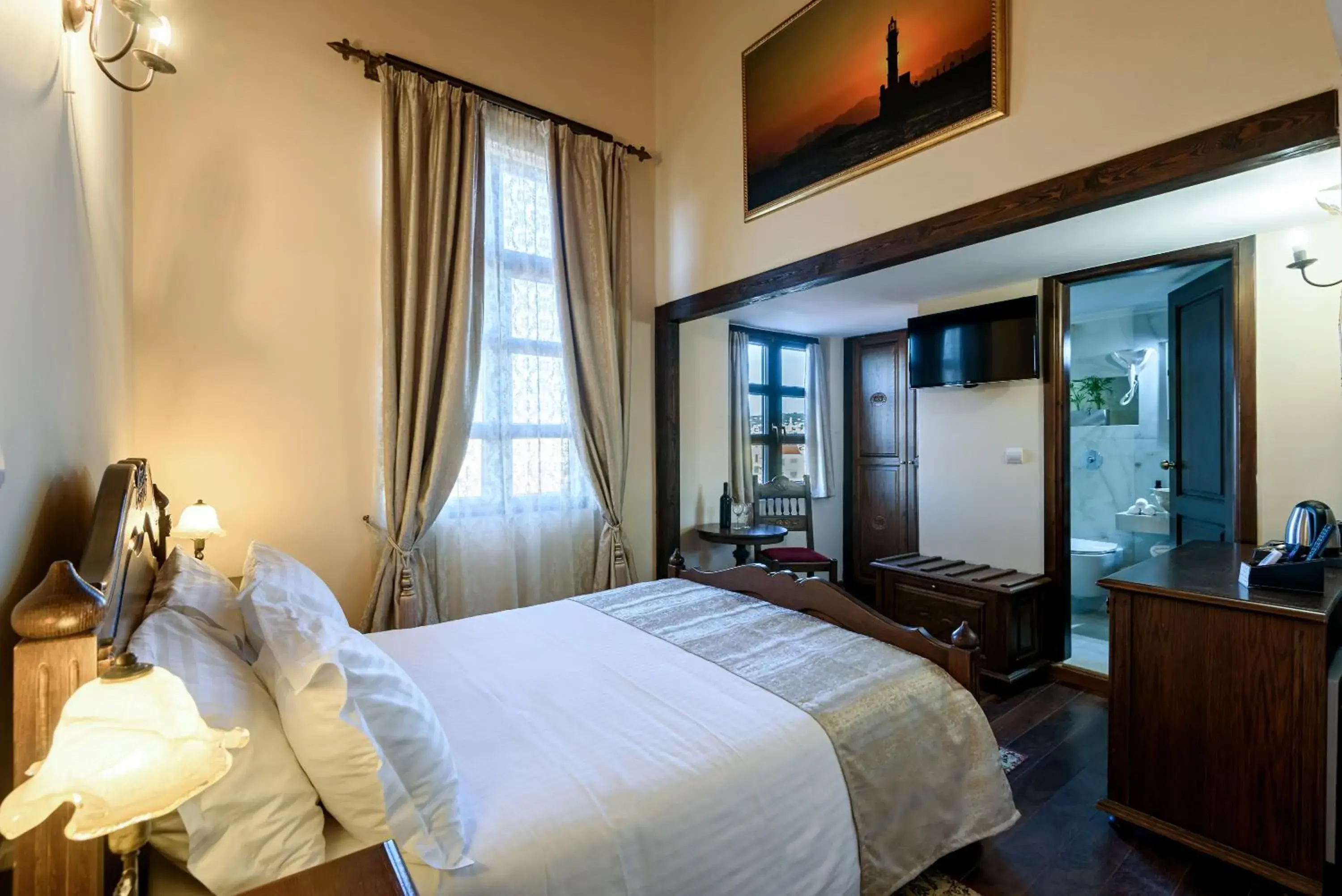 Photo of the whole room, Bed in Porto Del Colombo Traditional Boutique Hotel