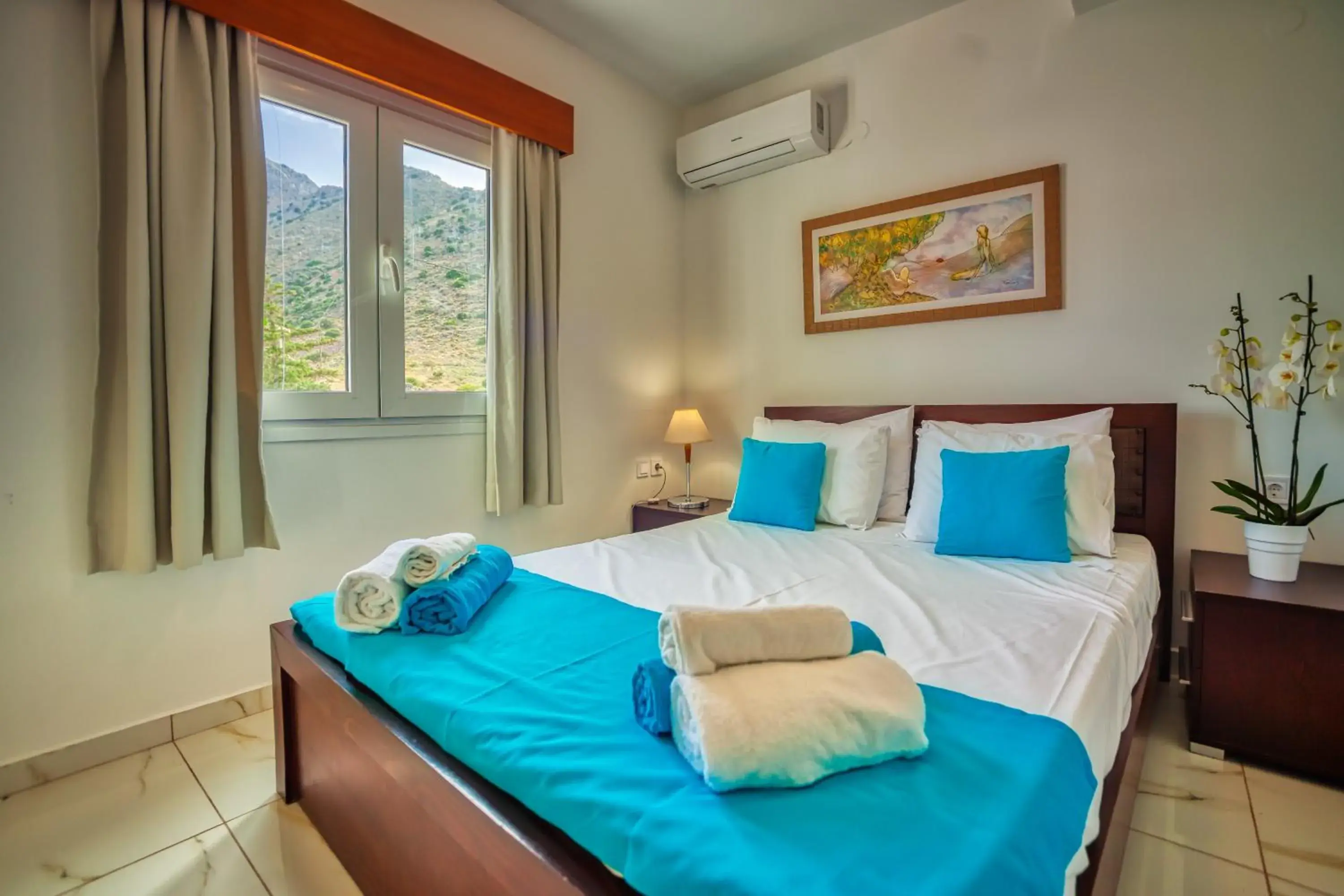 Bed in Elounda Water Park Residence Hotel