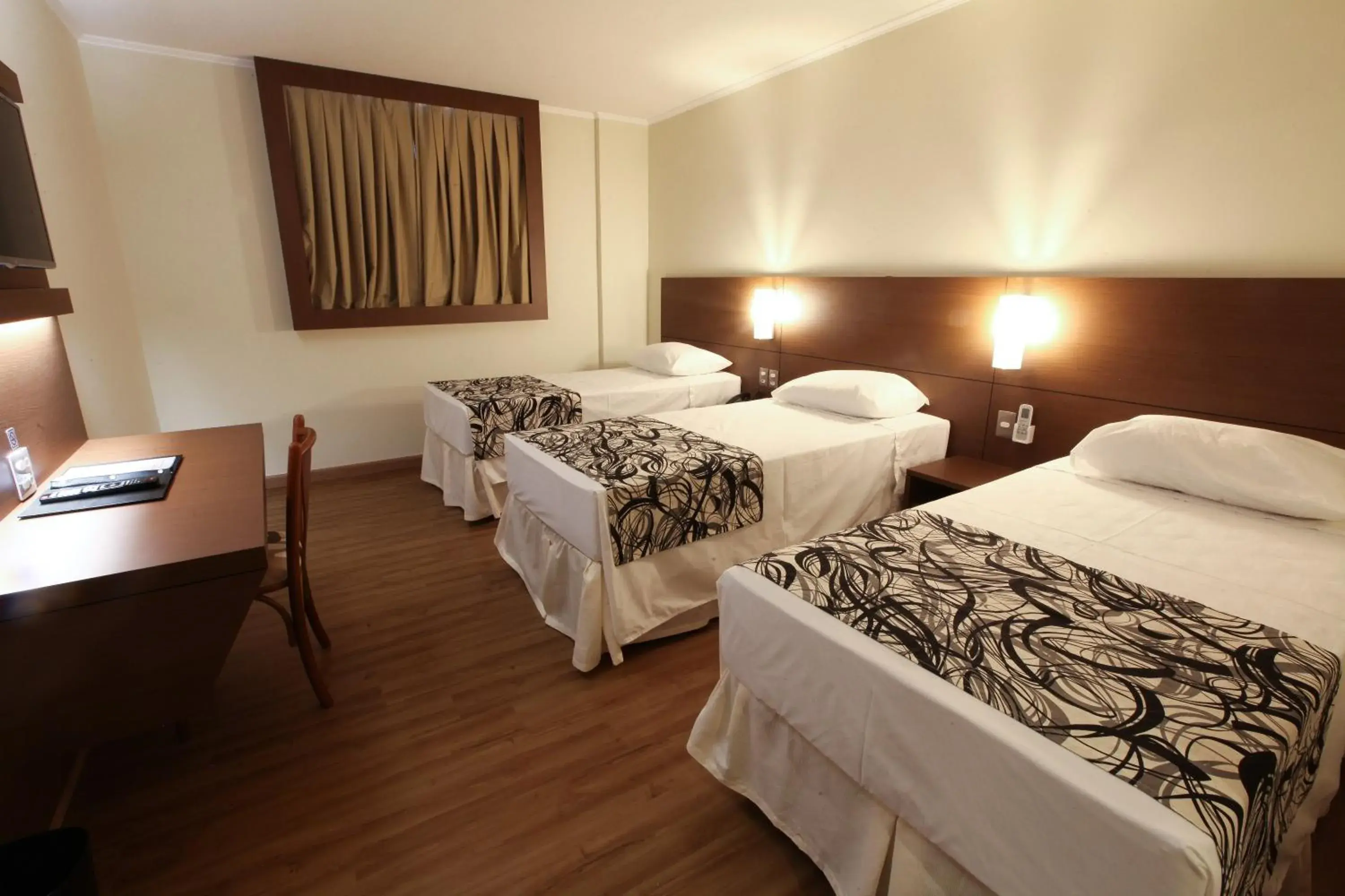 Photo of the whole room, Bed in Hotel Caiuá Cascavel