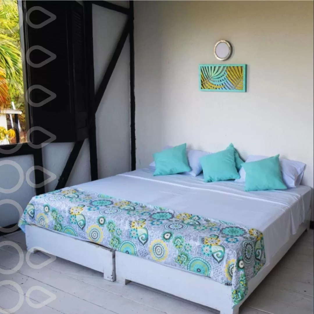 Bed in Massalli Sanctuary Lodge