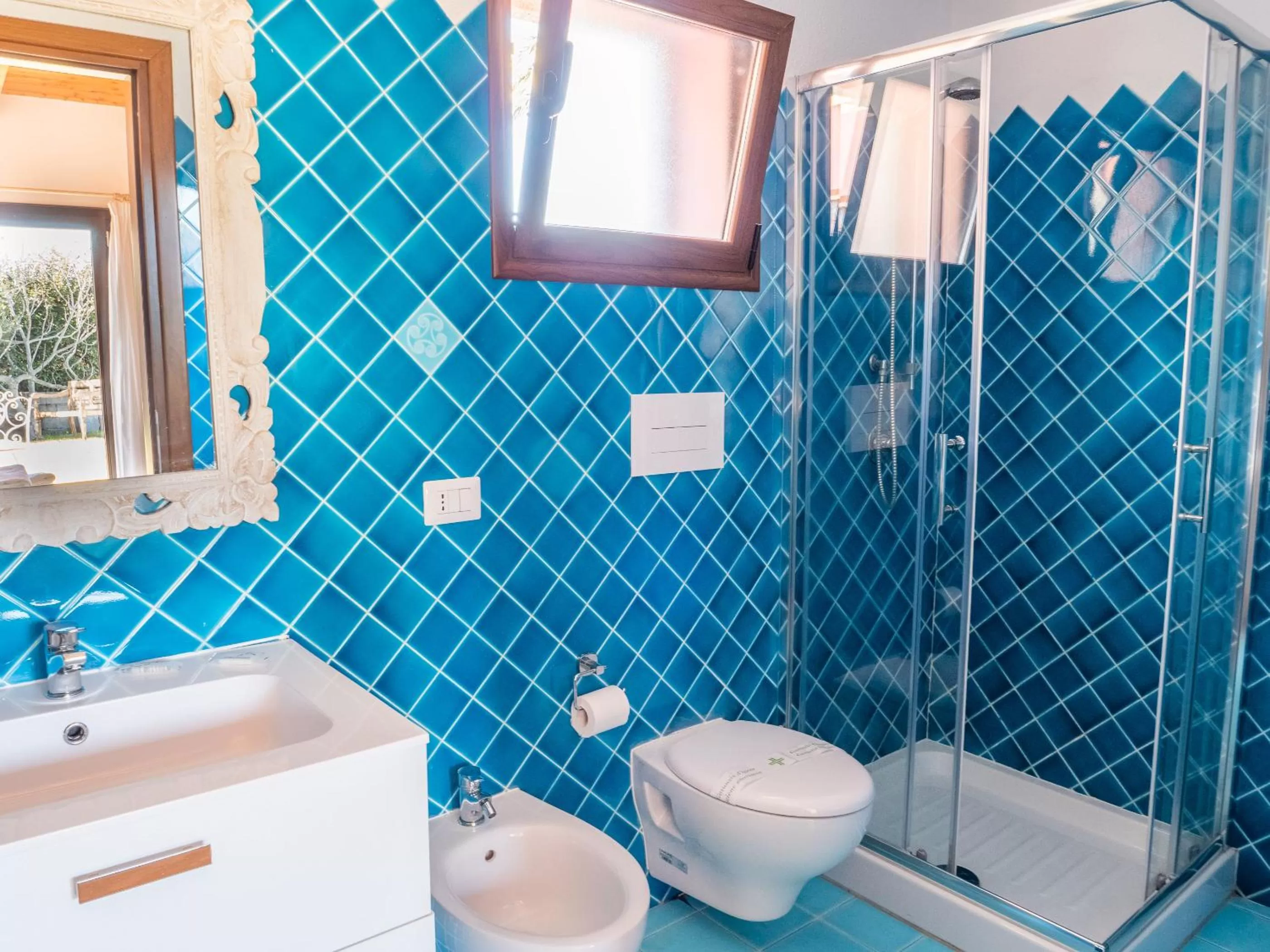 Bathroom in QUADRIFOGLIO Affittacamere